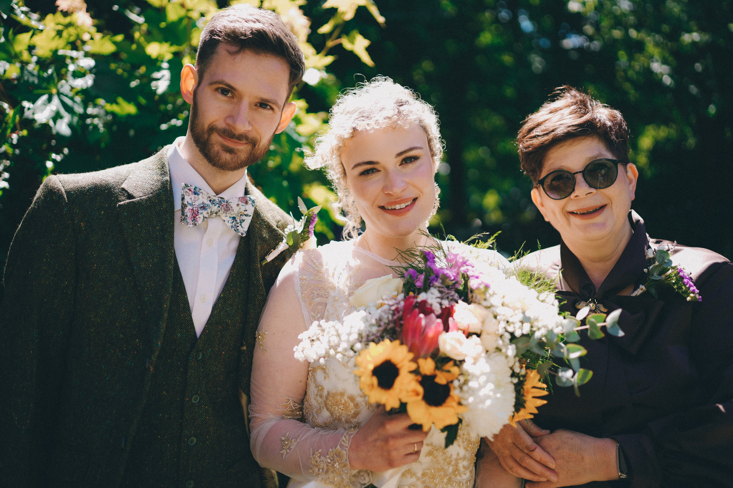 Outdoor wedding portrait with family in Solihull, natural joyful celebration