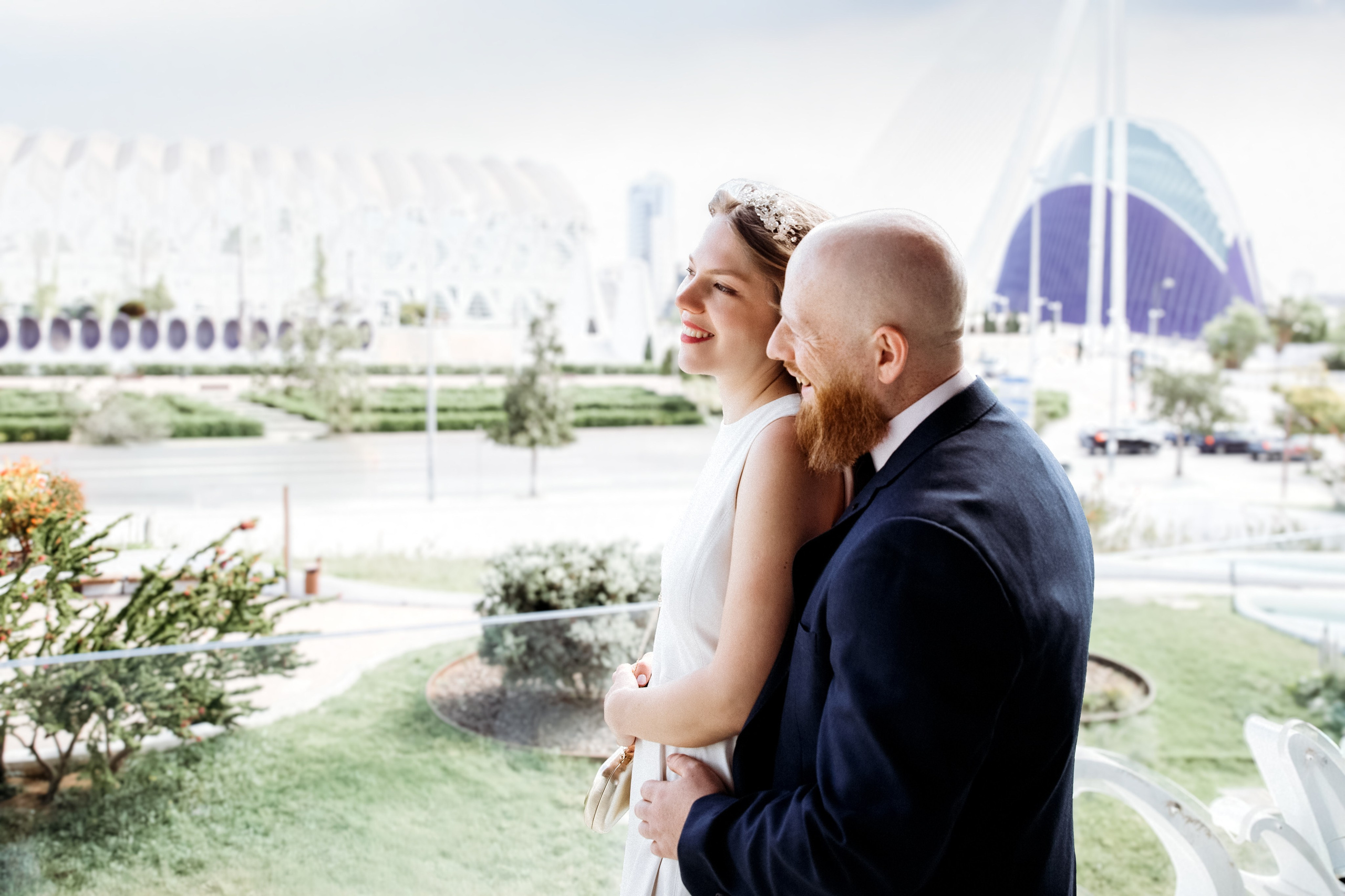 wedding photos in Valencia, Spain featuring a couple with the City of Arts and Sciences in the background