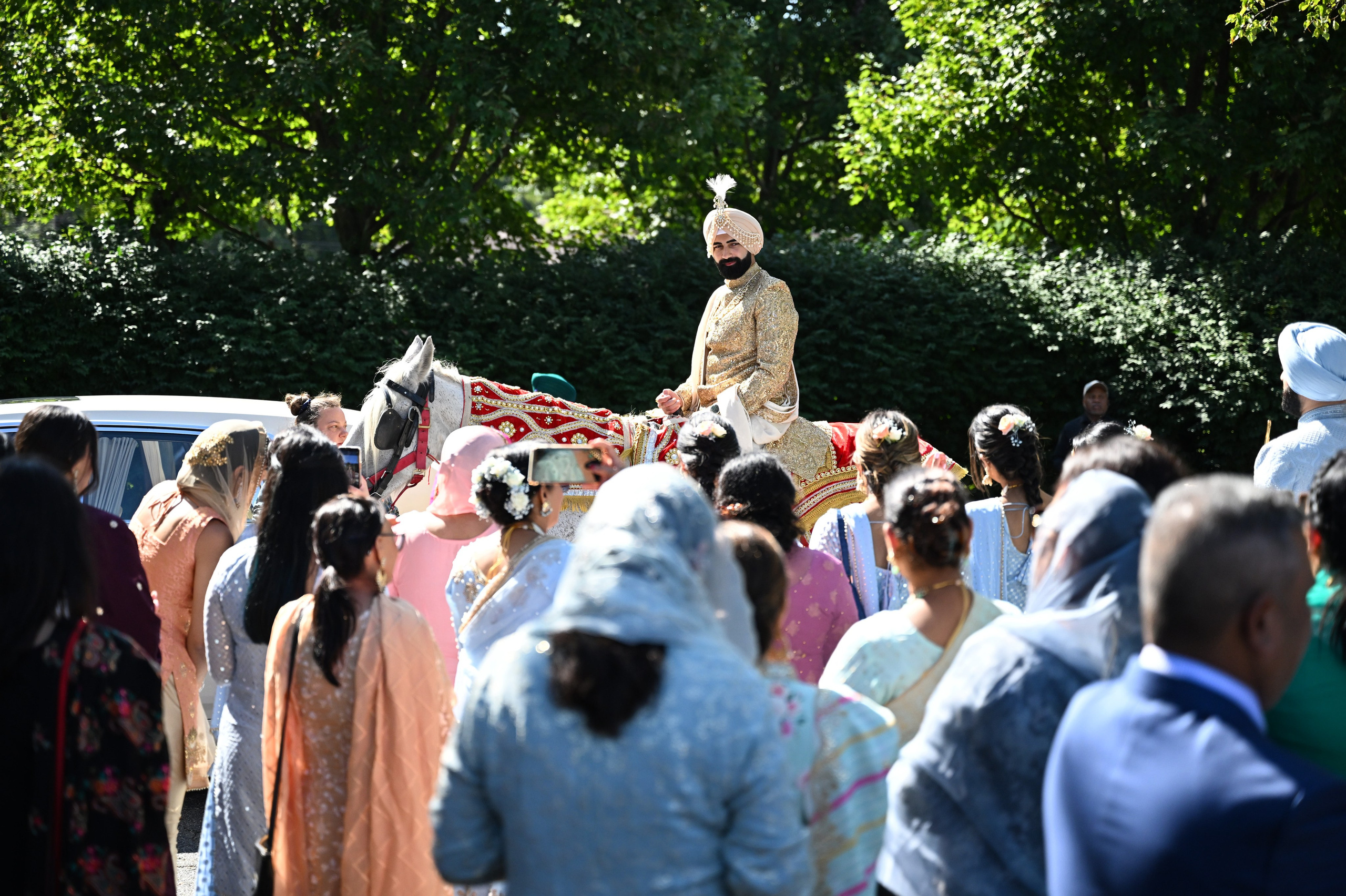 a man on a horse in a crowd of people