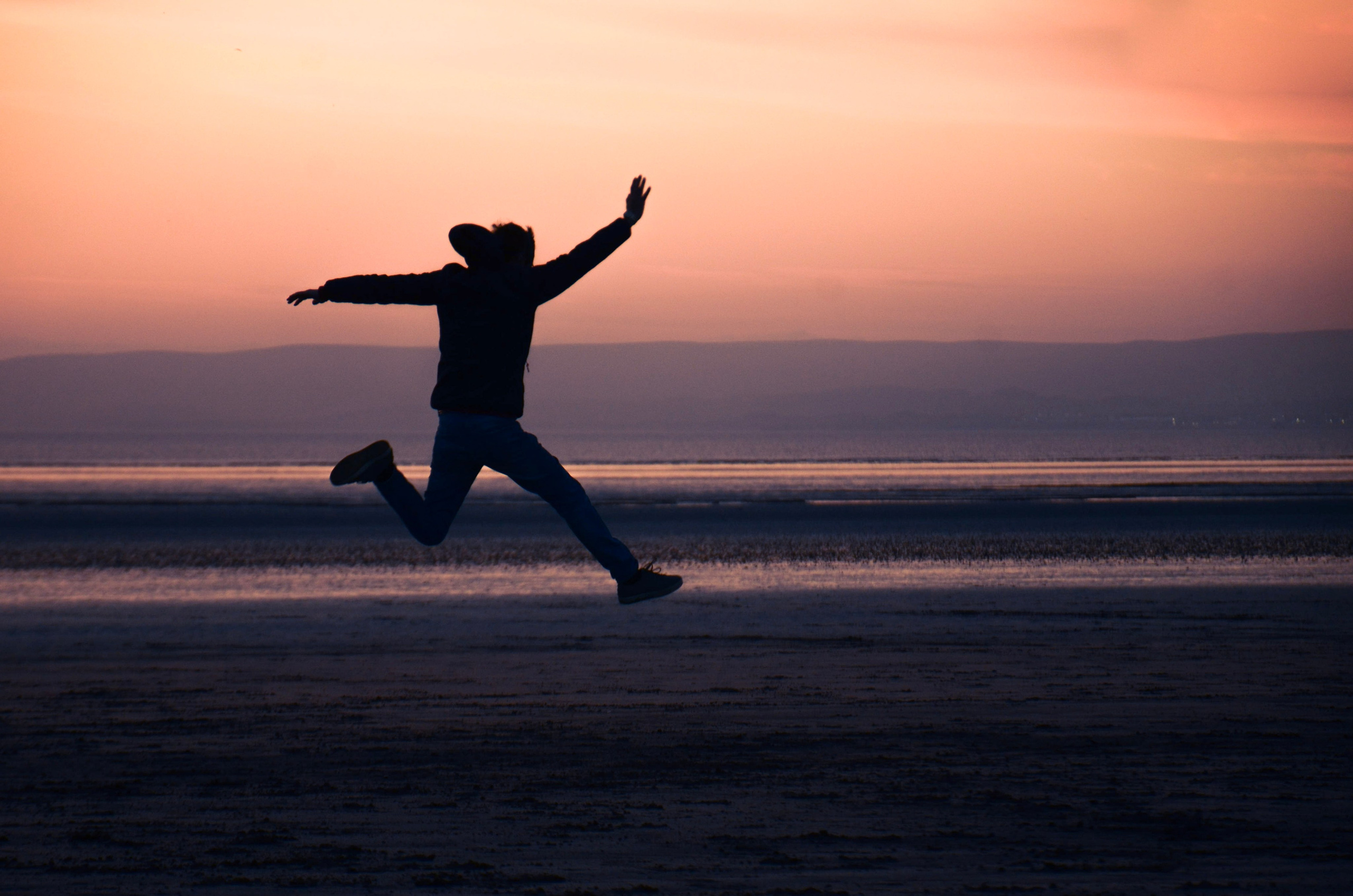Dynamic artistic portrait photography capturing movement at sunset by Birmingham portrait photographer