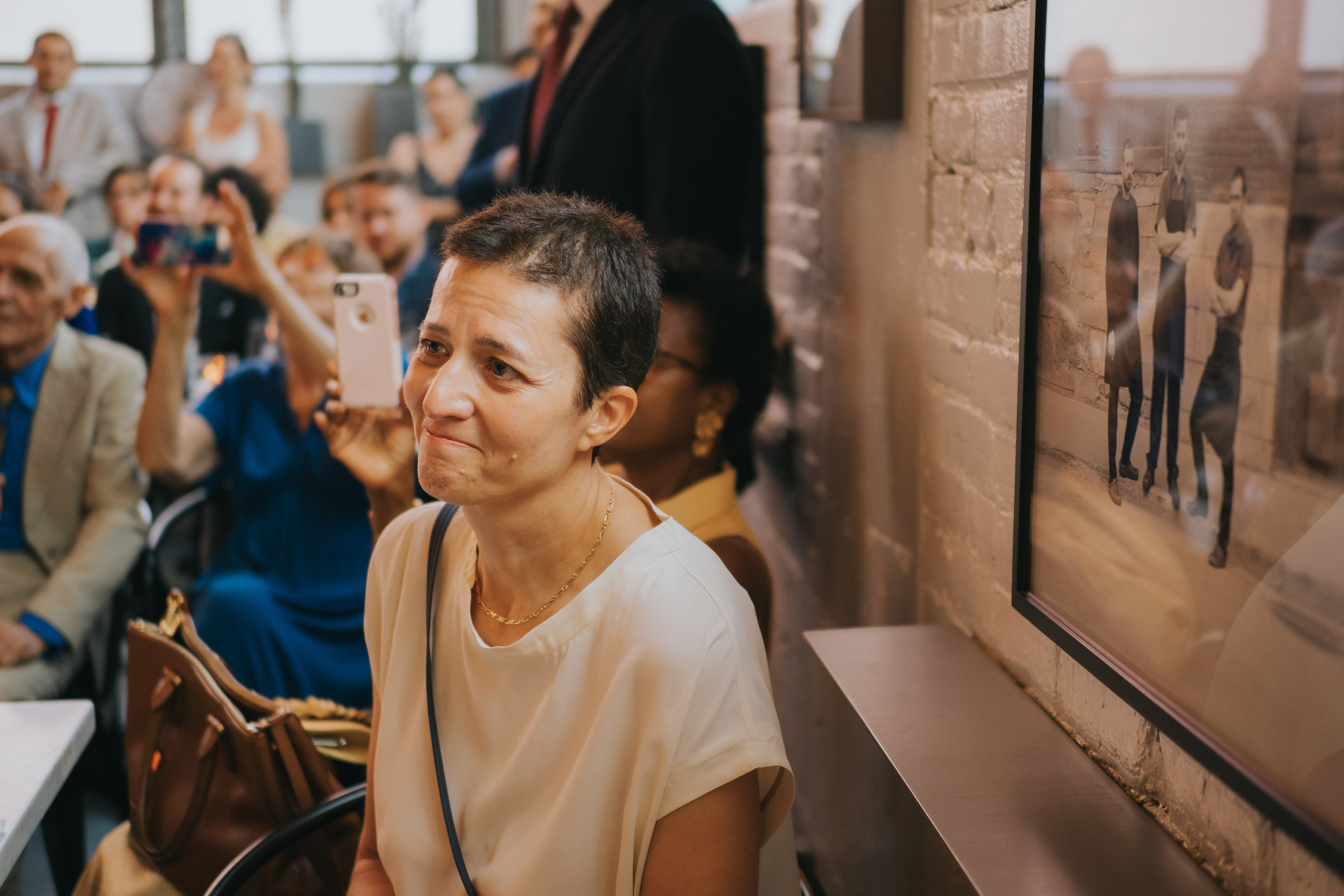 Mother crying in Montreal, captured with intention by Montreal wedding photographer Muriel Oe