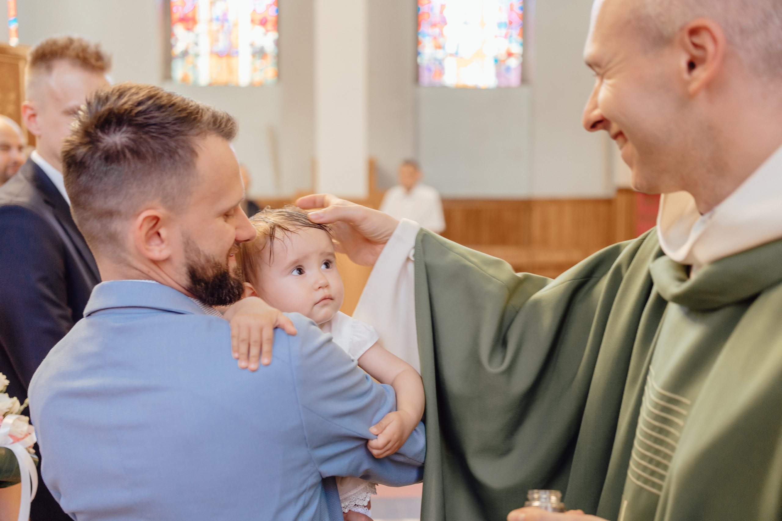 Reportaż z okazji chrztu świętego w Łodzi. 