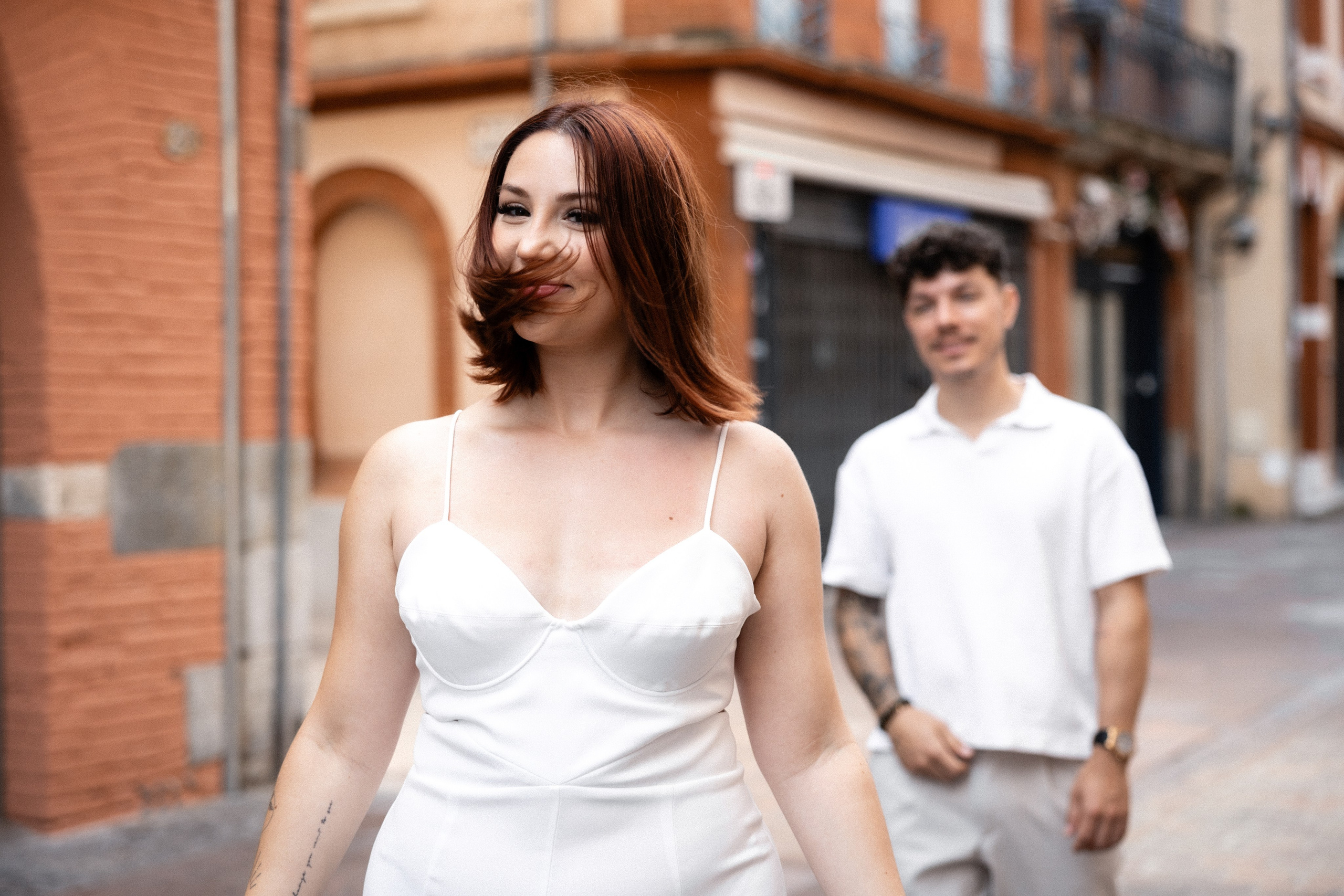 close portrait of a couple smiling during a session in Toulouse