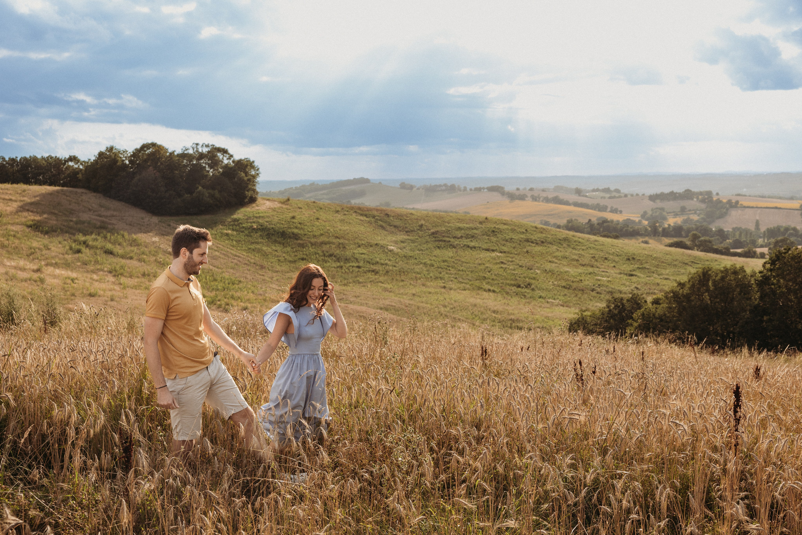 Couple during an engagement session in a charming countryside in France