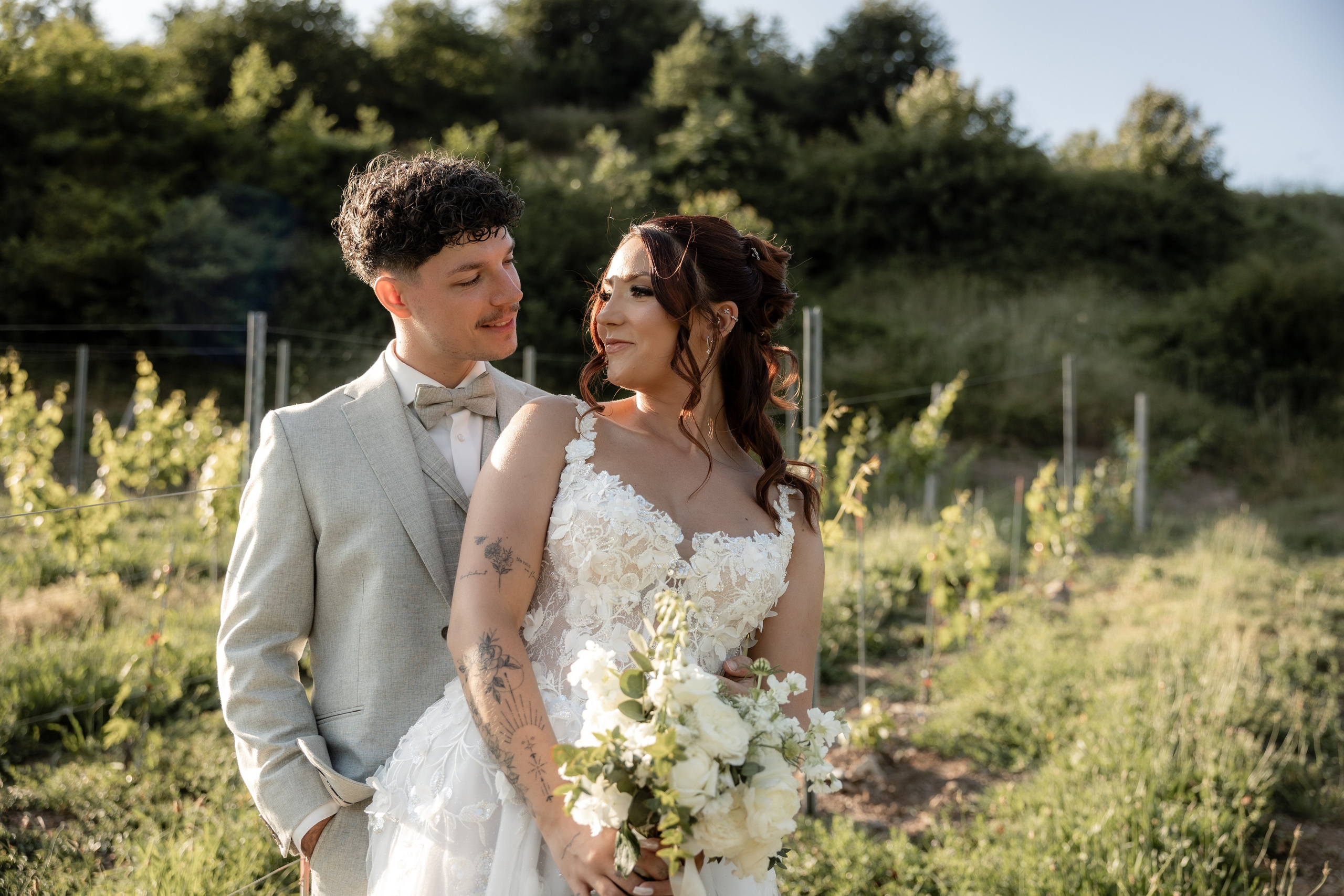 Bride and groom sharing a romantic moment at a château wedding in Southwest France