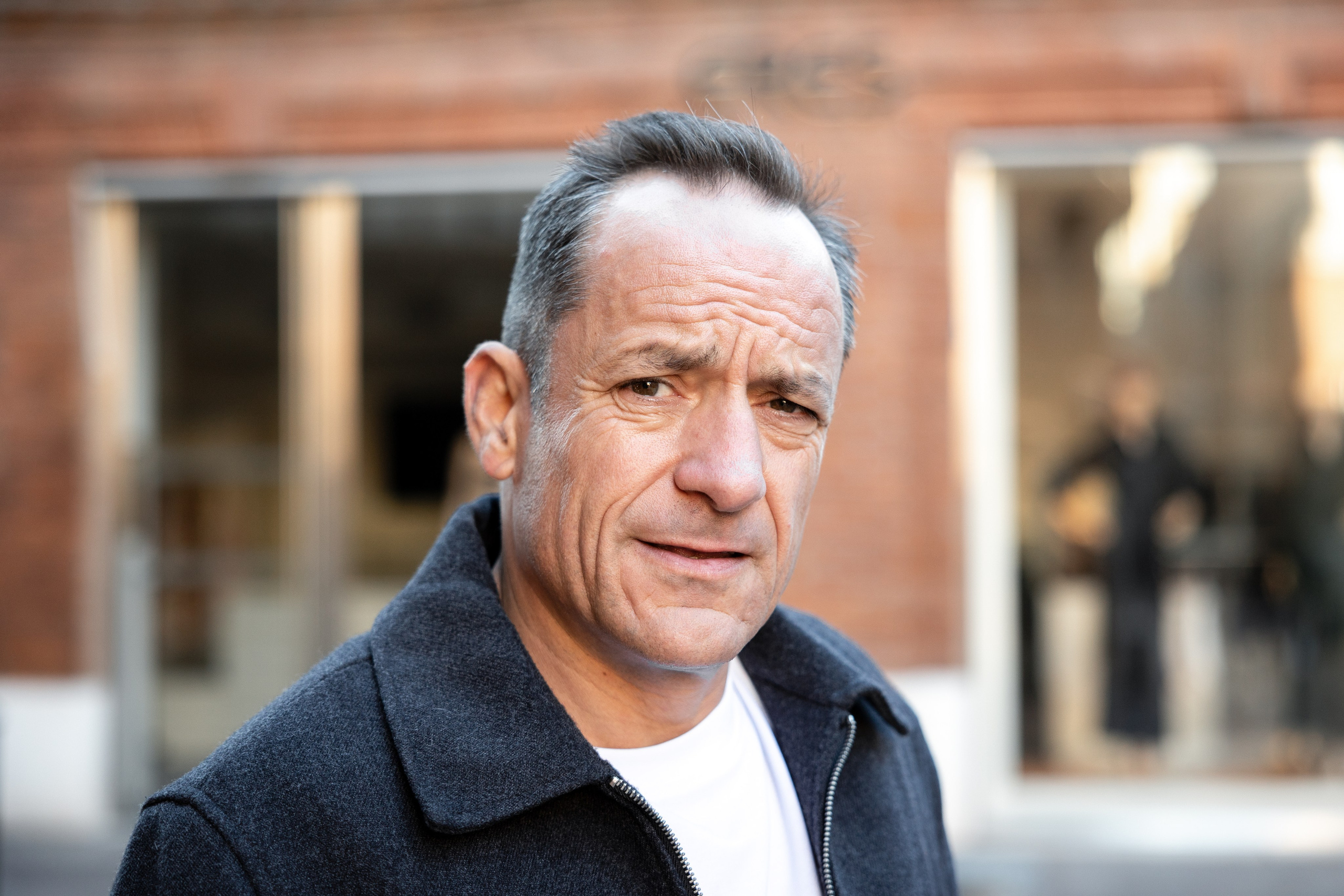 Executive portrait of a business leader during a personal branding photoshoot in Toulouse city environment