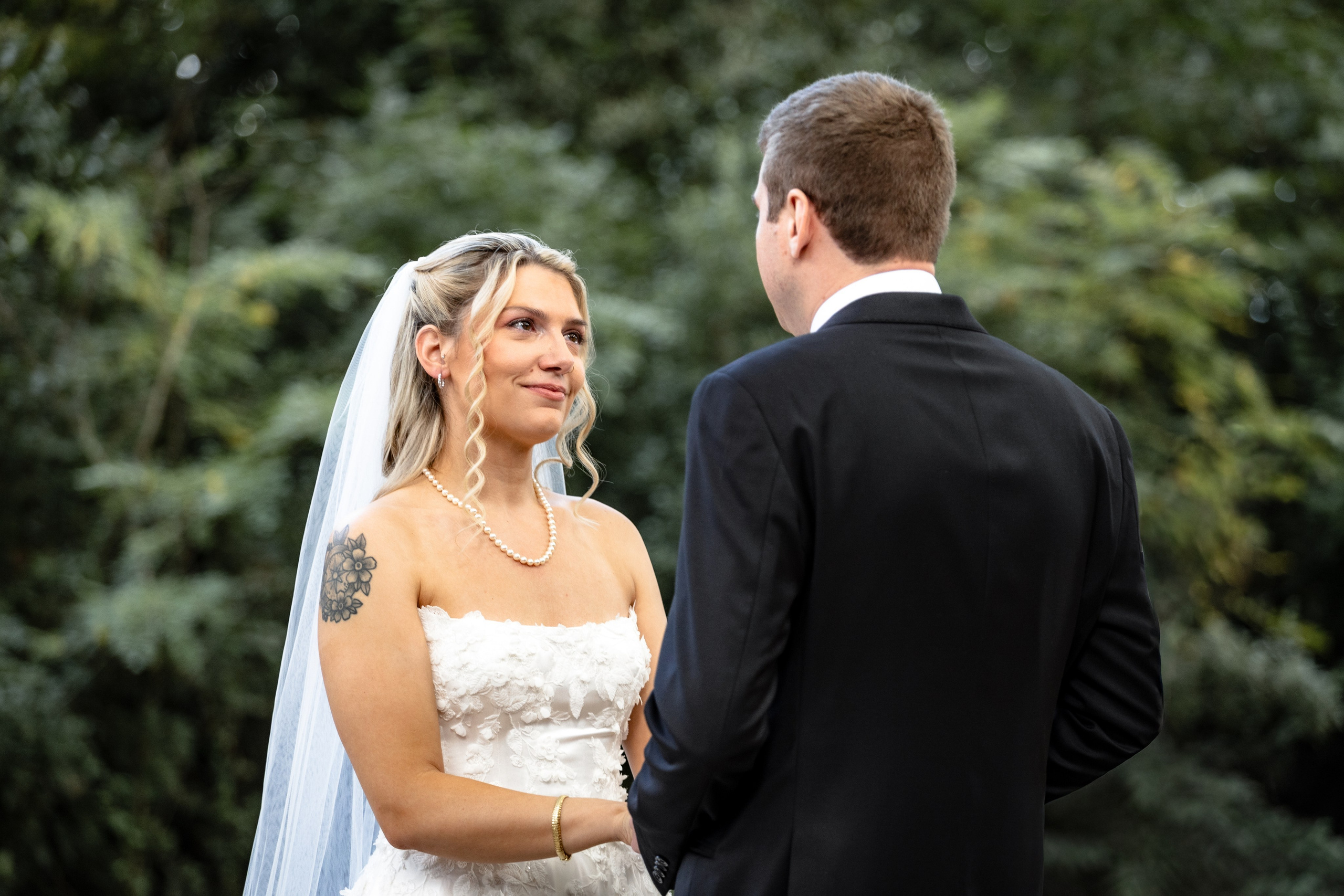 Bride and groom during their wedding ceremony photographed by a destination wedding photographer in France.