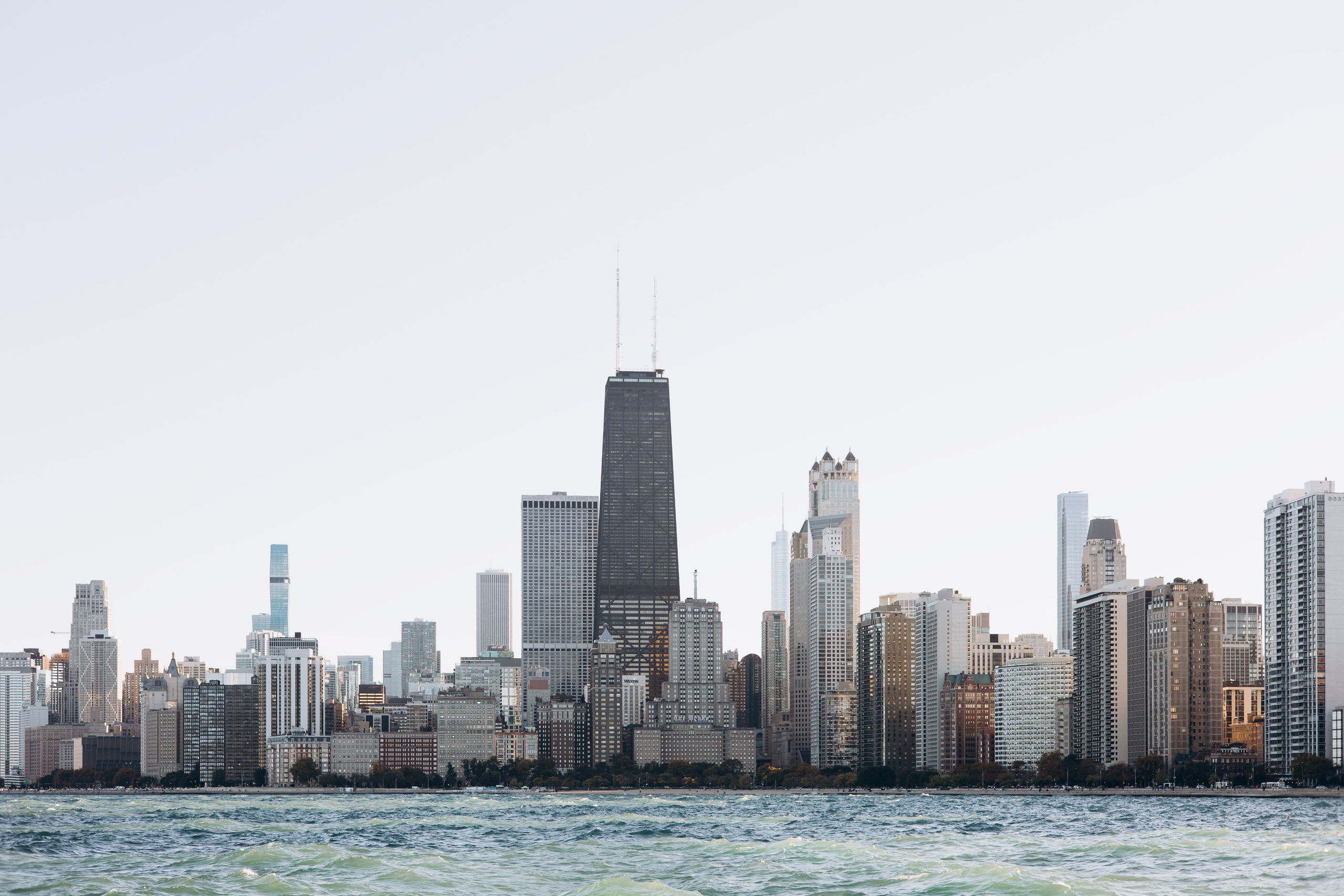 Chicago skyline engagement photo at sunset from the lakefront.