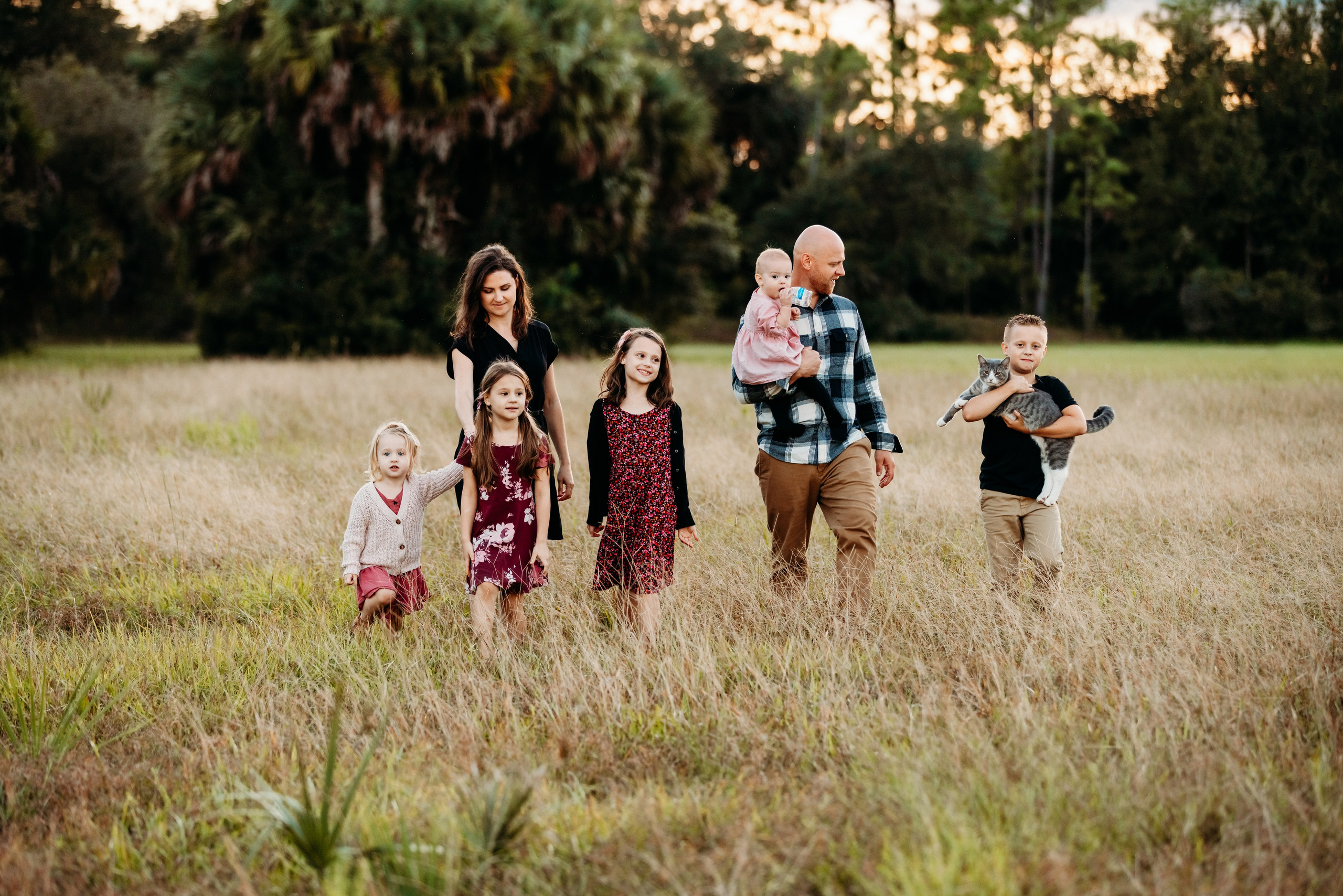 Family photoshoot on the field