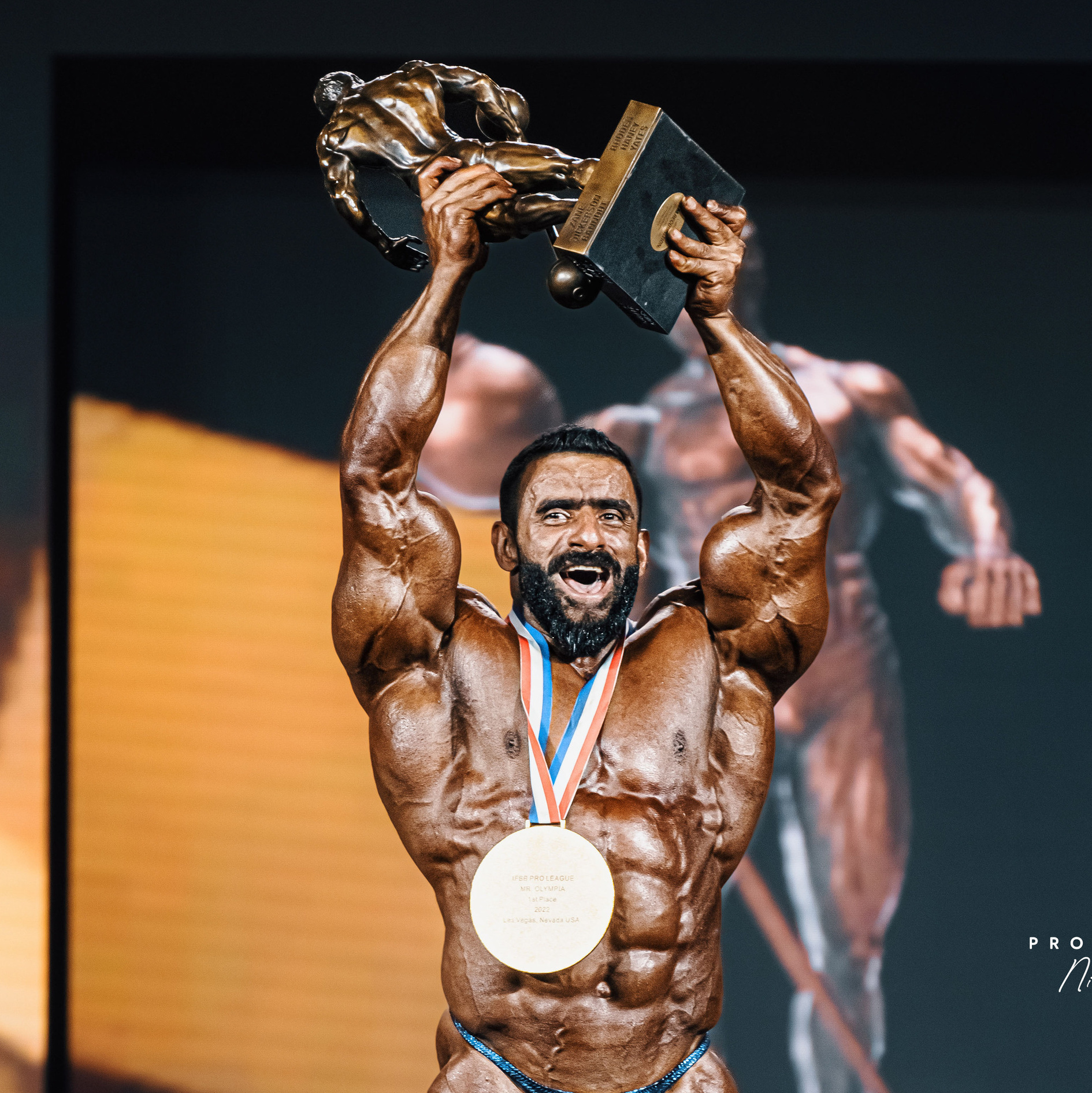 Hadi Choopan is a professional bodybuilder from Iran, who is widely considered to be one of the best bodybuilders in the world. He was born on November 10, 1988, in Babol, Iran. Choopan has competed in several major bodybuilding competitions, including the Olympia, where he placed third in the Men's Open category in 2020. Choopan is known for his impressive physique, which is characterized by his well-developed legs and overall muscularity. He is often referred to by his nickname "The Persian Wolf" and has a large following on social media, where he shares his training and diet tips with his fans. Choopan's rise to fame in the bodybuilding world has been a source of inspiration for many young people in Iran and around the world, and he is widely regarded as one of the most successful athletes from Iran in recent years.