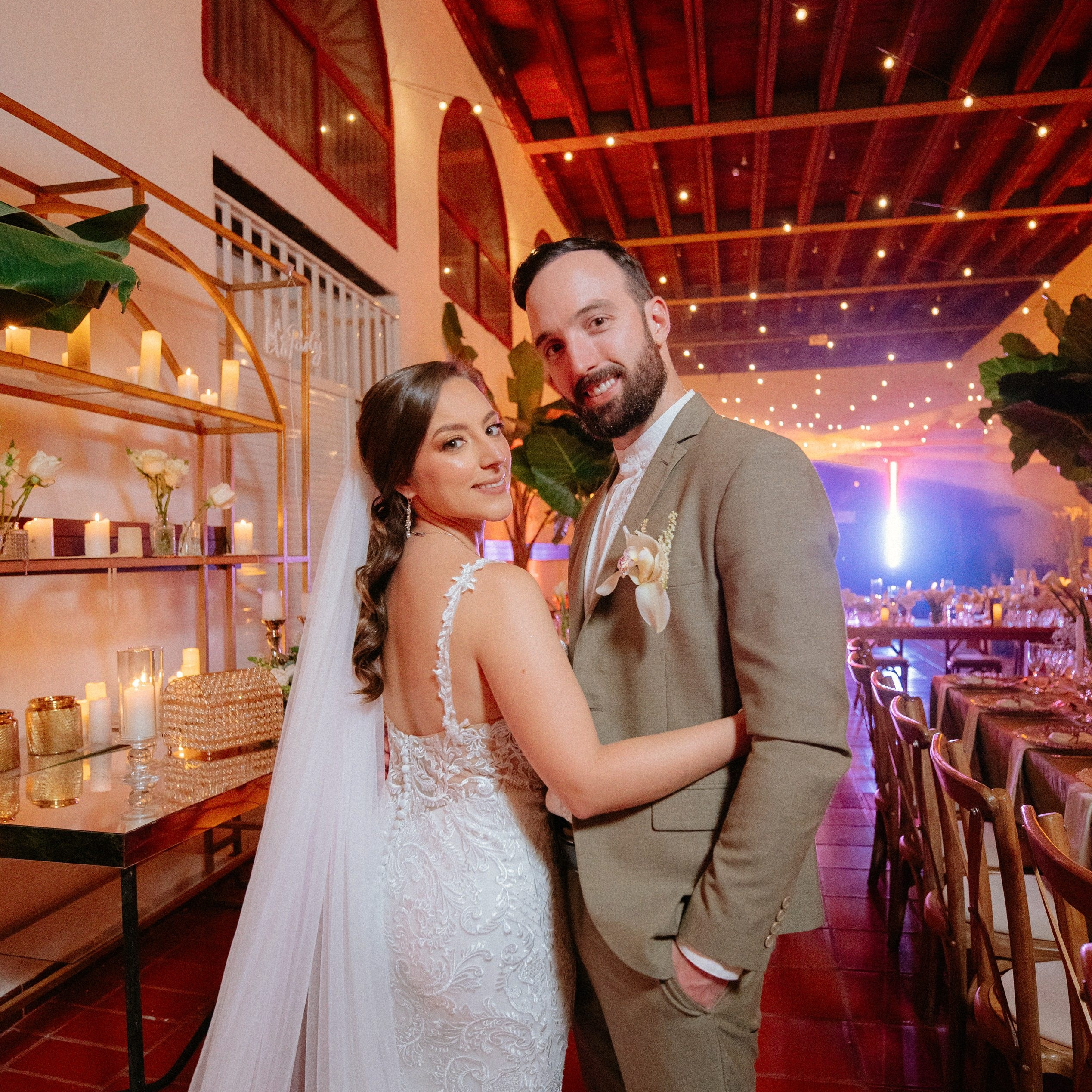 Bride and groom indoor reception – “Bride and groom dancing at their indoor reception with ambient lighting, high-quality wedding photoshoot in Cartagena”