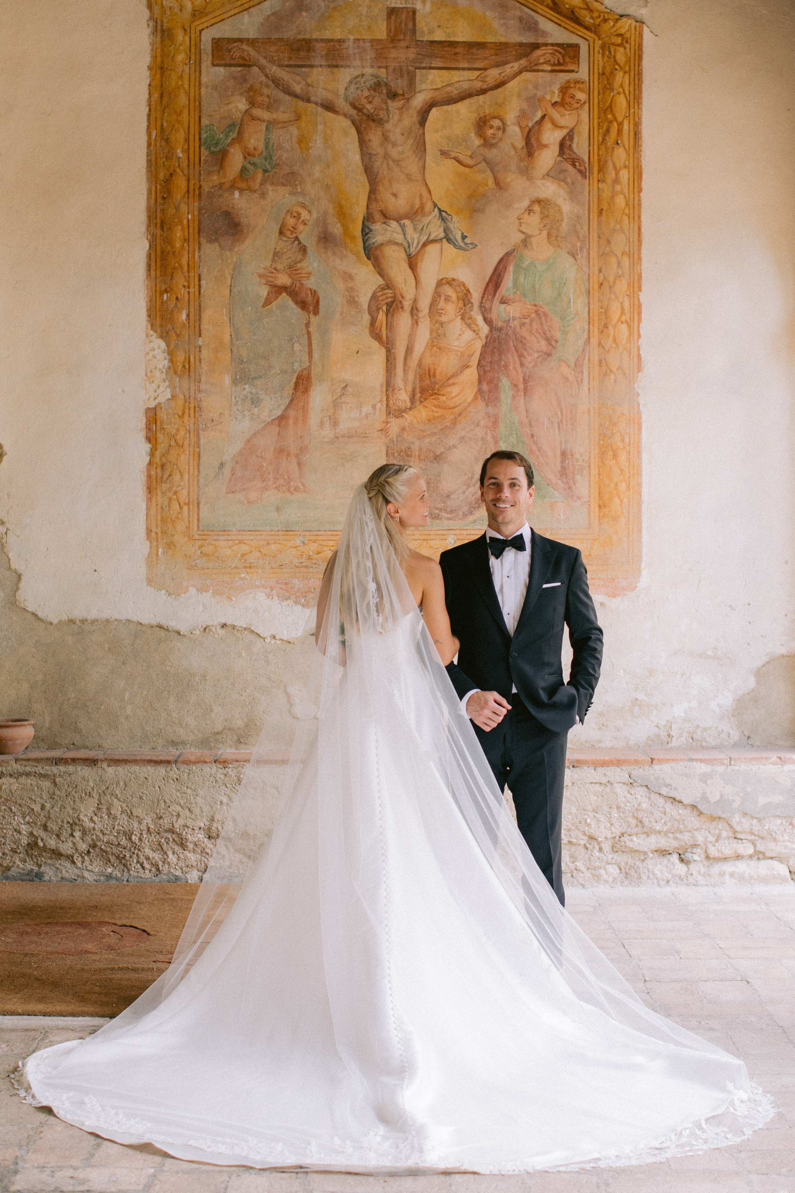 Destination wedding photographer in Tuscany Italy capturing bride portrait at luxury villa wedding