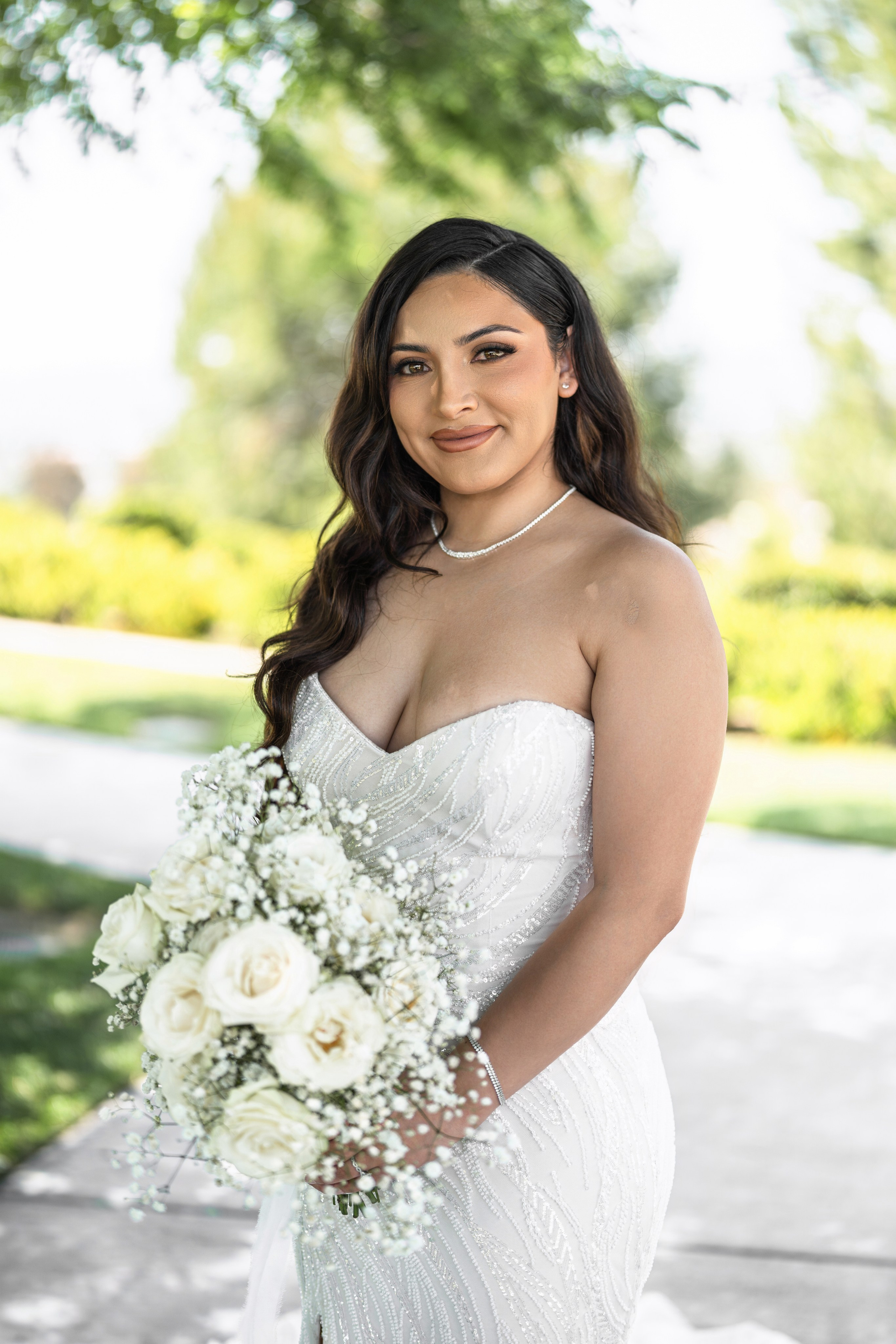 Wedding Bride in a beautiful white dress and flowers