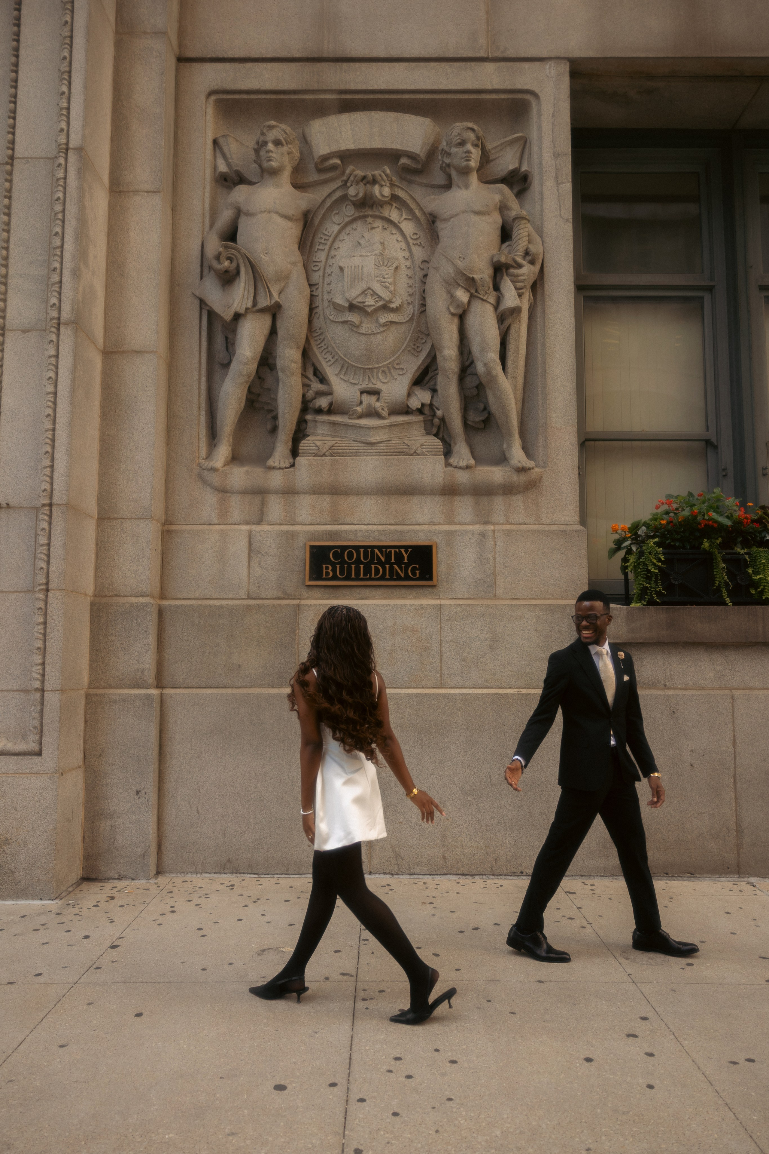 Intimate couple photoshoot in Chicago downtown with warm candid style.