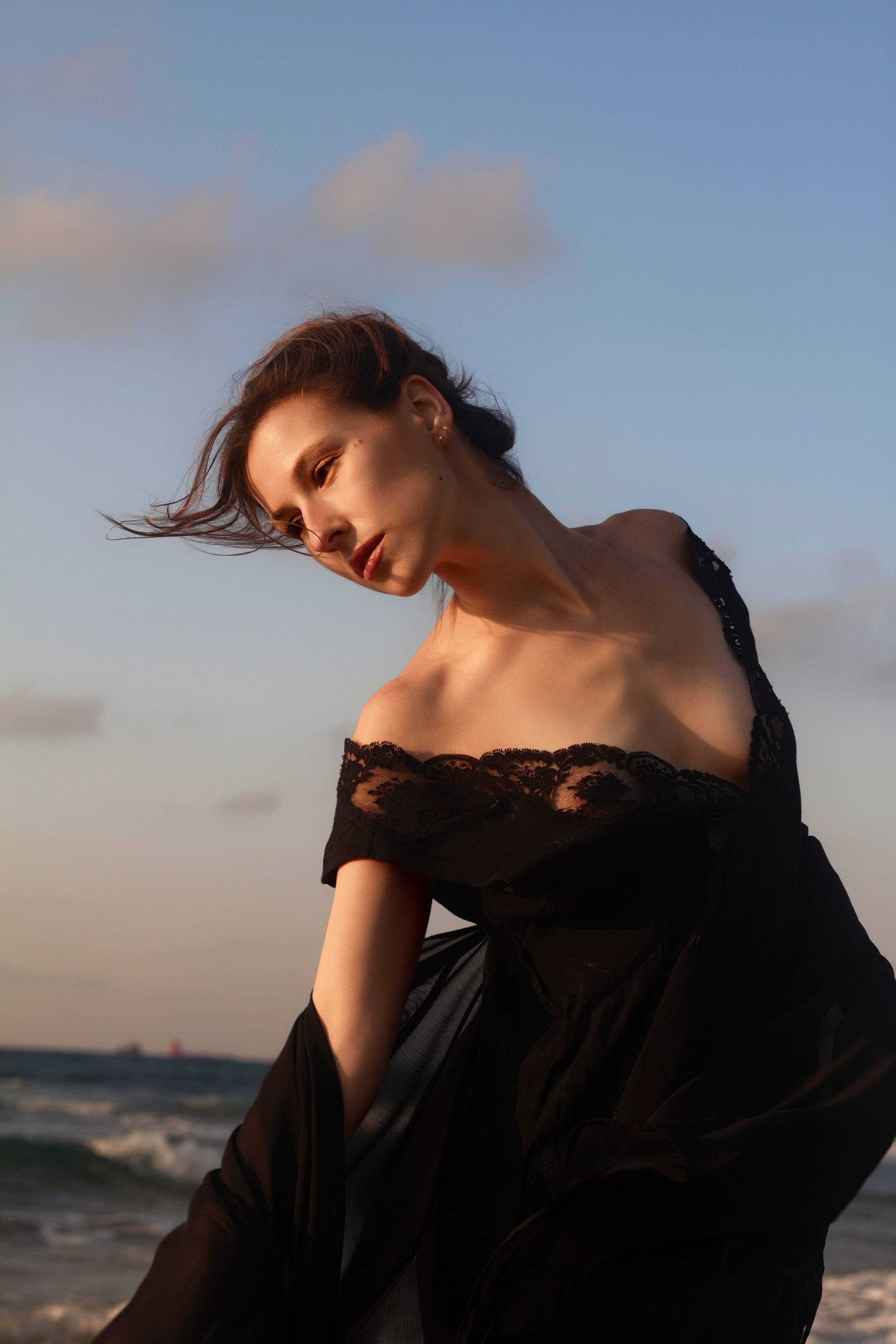 Istanbul photographer specializing in lifestyle, portrait and love story photography. Atmospheric photoshoots by the sea and on rooftops with cinematic aesthetic, warm sunset light and authentic Istanbul vibes.