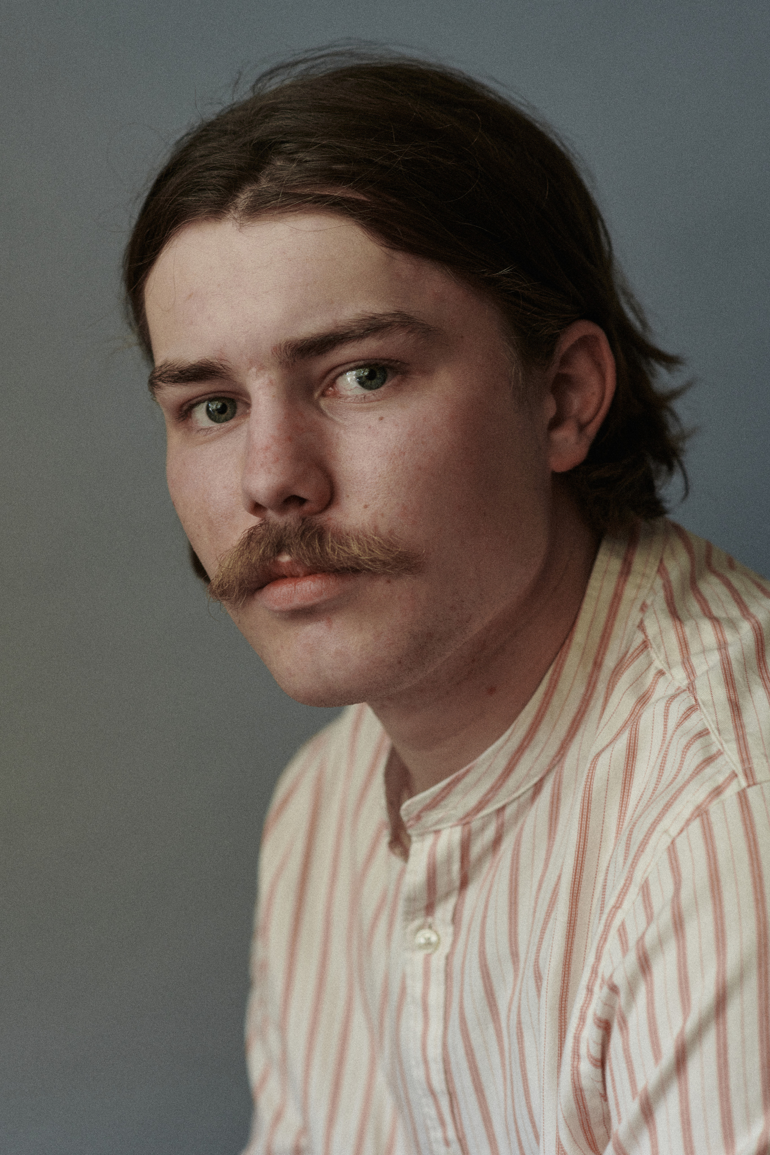 Portrait photographer Amsterdam photo session in the studio, a young Dutch designer.