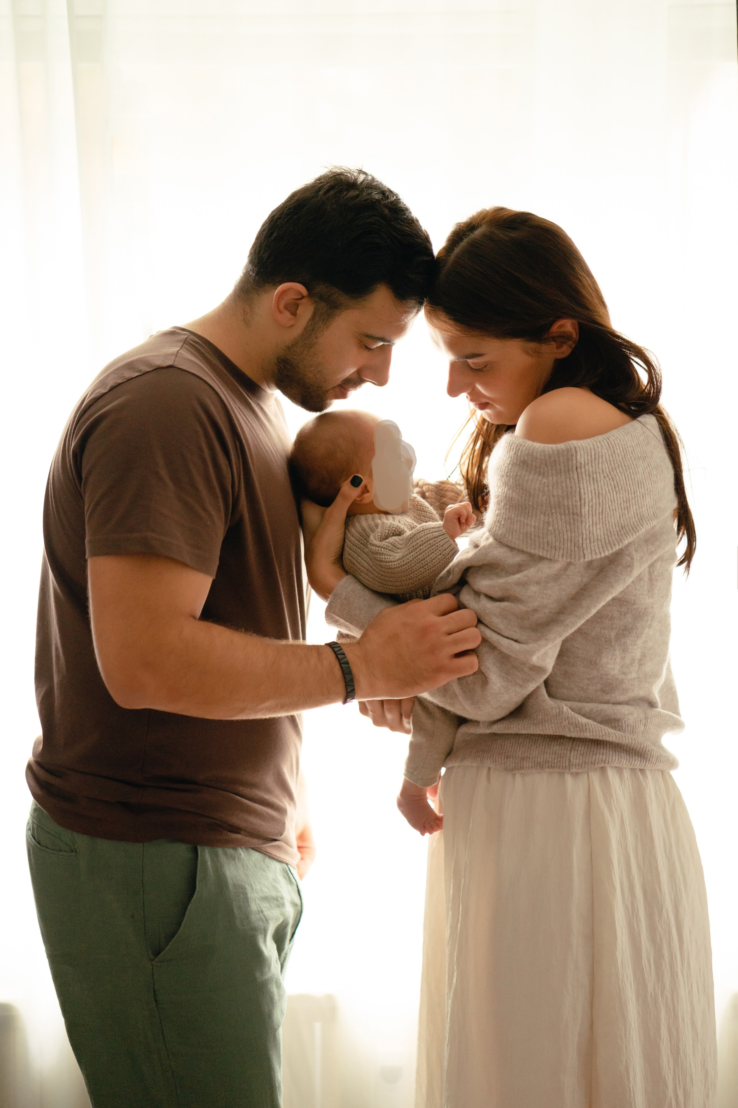 Photo shoot for a family with new born baby