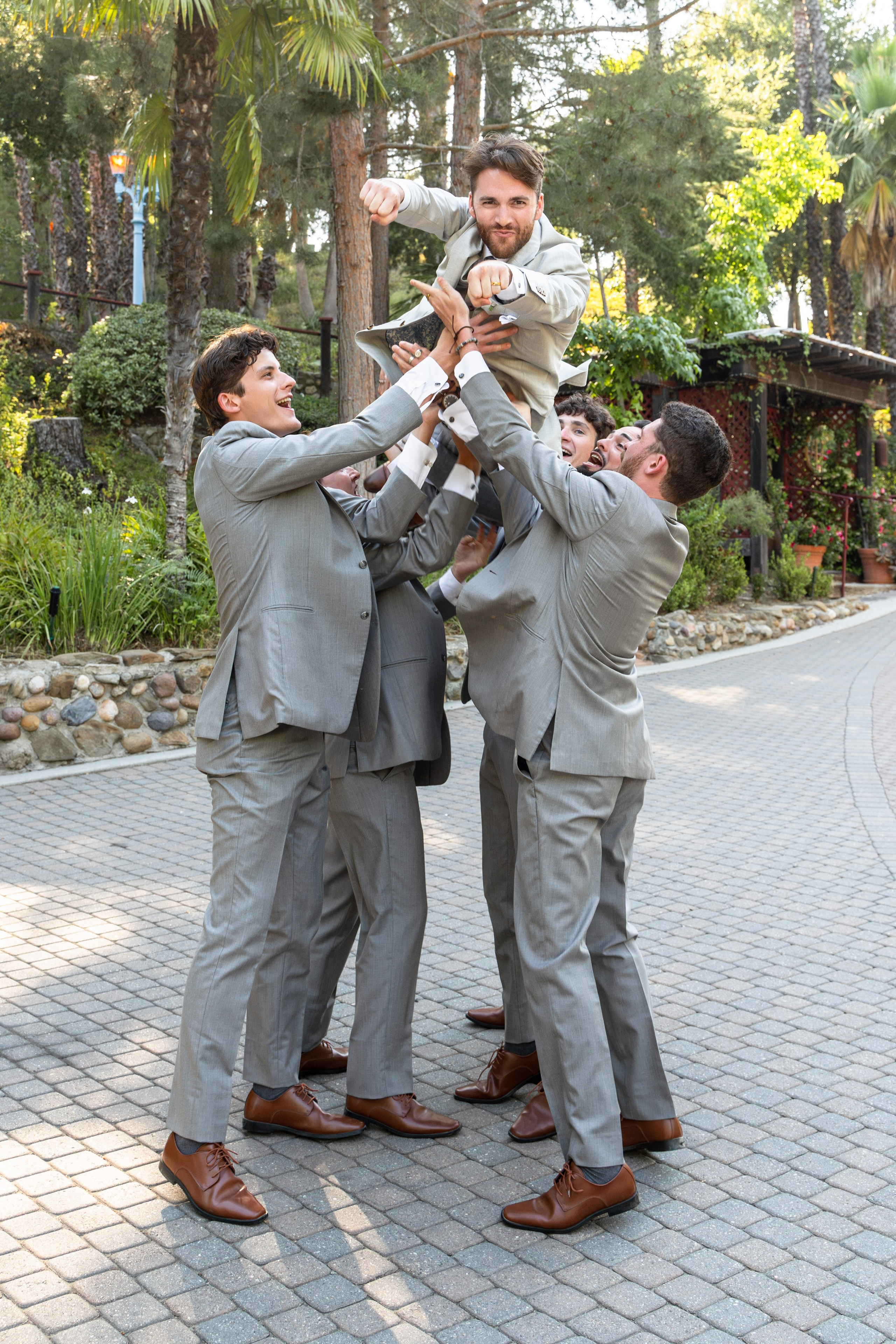 Wedding groomsmen are having fun