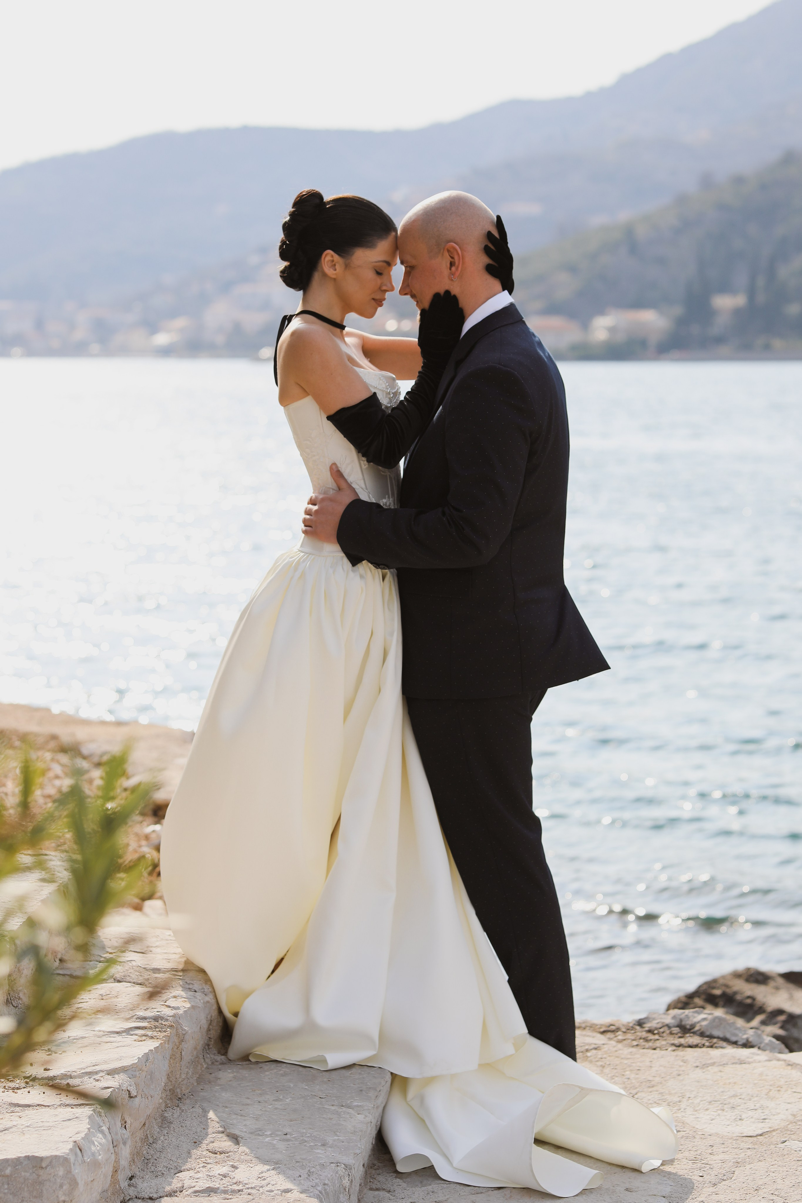 bride and groom by the sea, wedding photoshoot