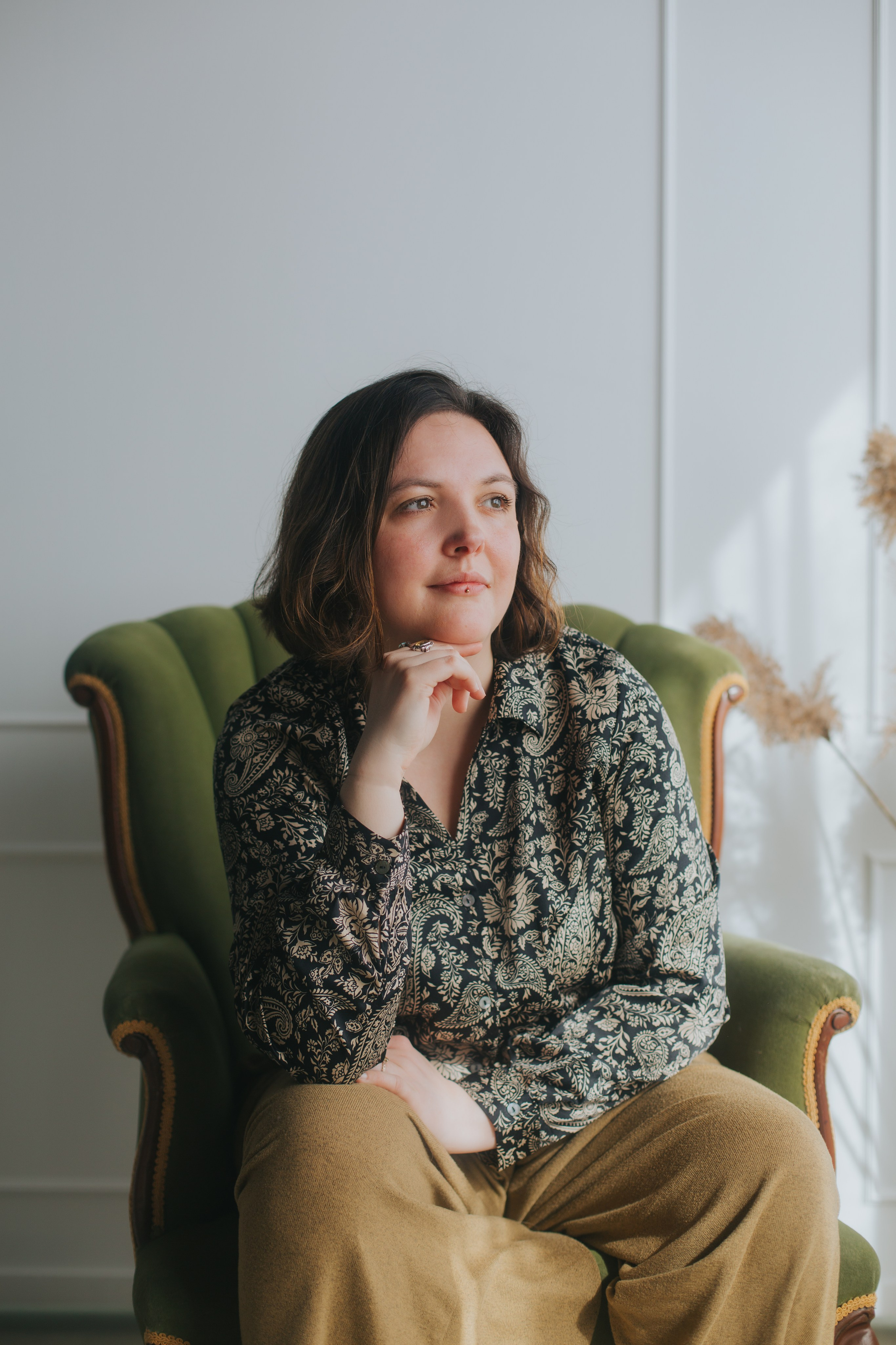 Picture of photographer holding a camera. 