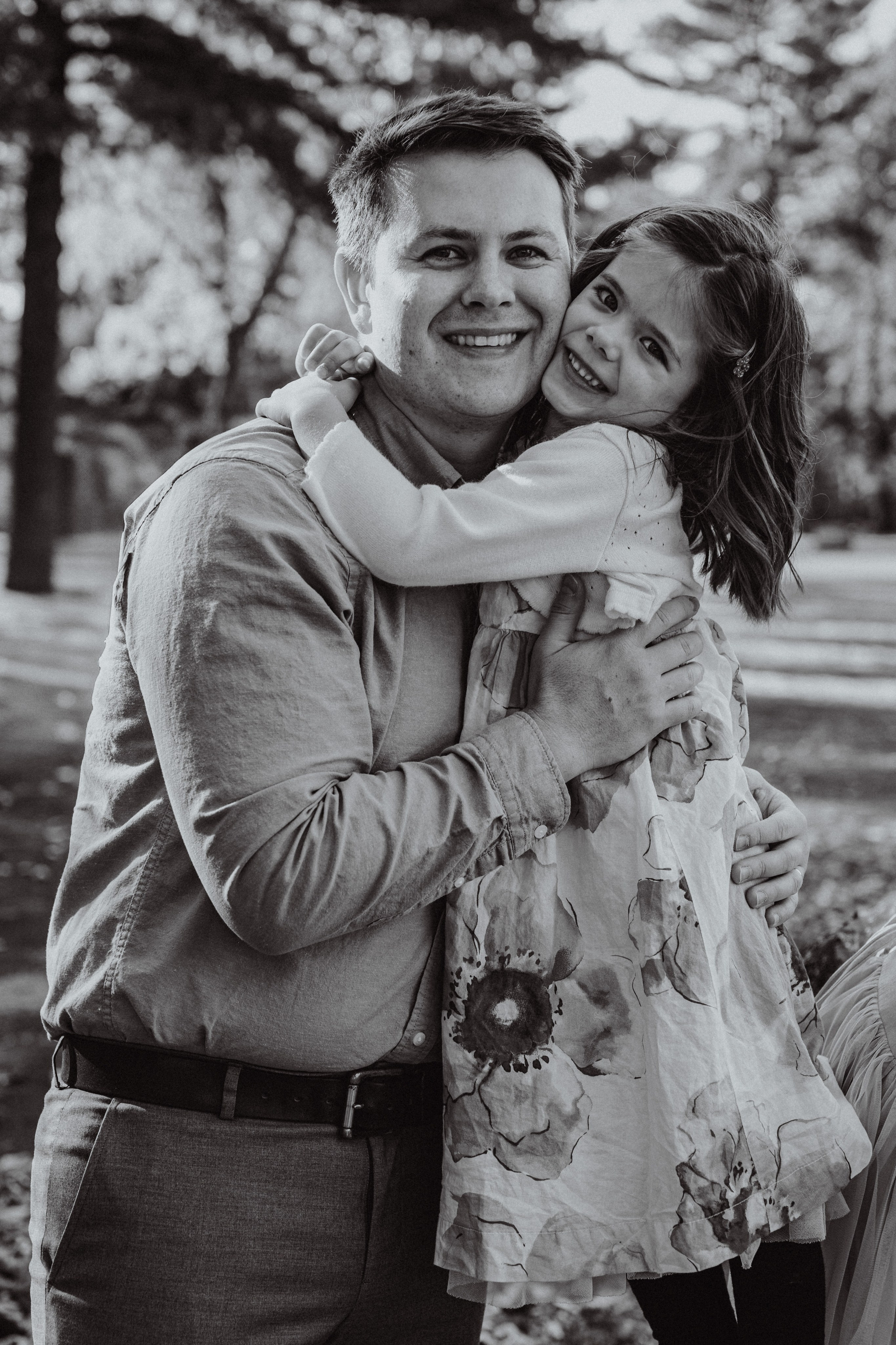 Experienced Wisconsin photographer offering family portraits, engagement photos, and lifestyle sessions serving De Pere and surrounding Fox Valley communities with custom photography services.