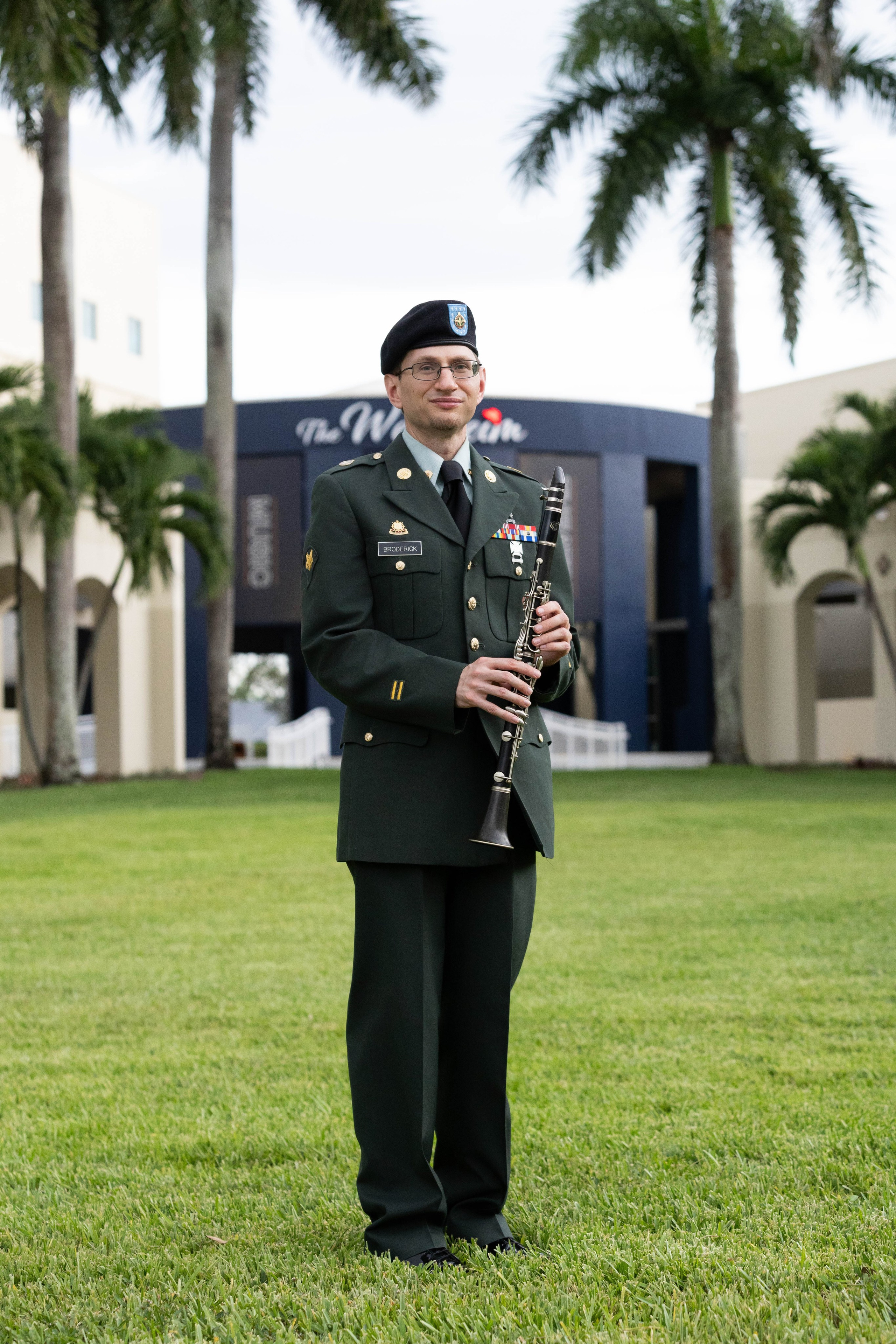 U.S. Army veteran Darren holds a clarinet outside the Wertheim School of Music.