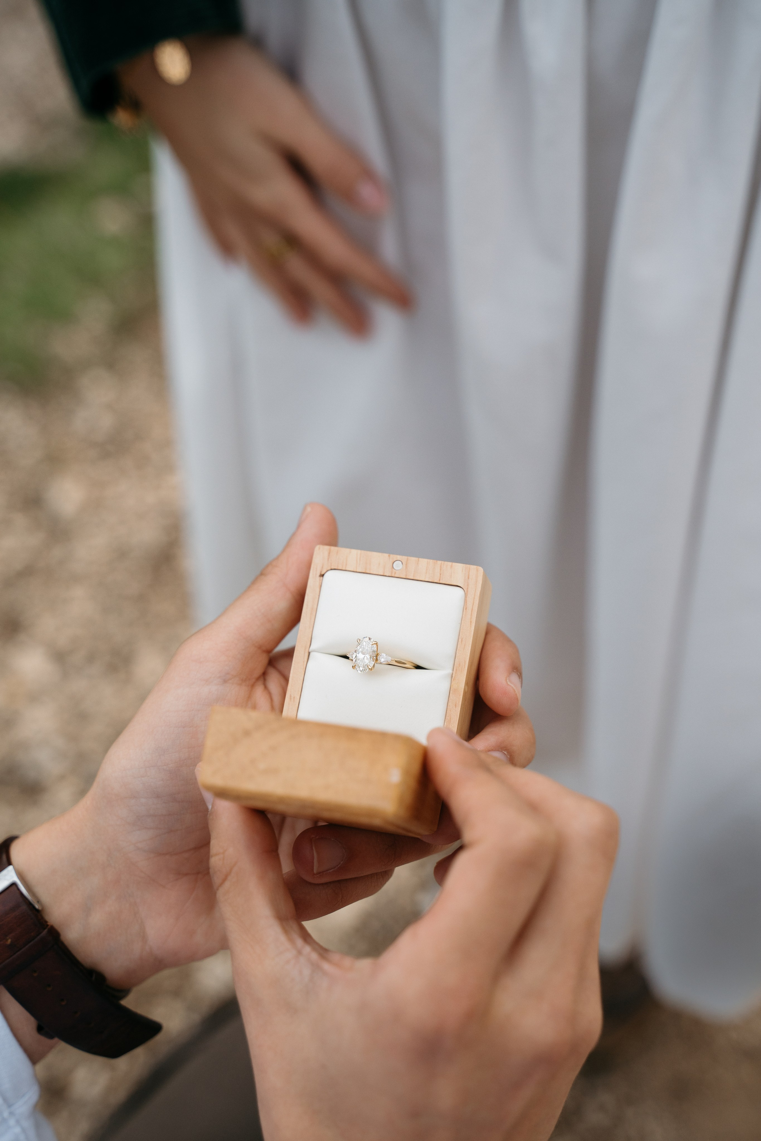 Engagement ring in box during Dolomites marriage proposal, romantic detail photography in Italy