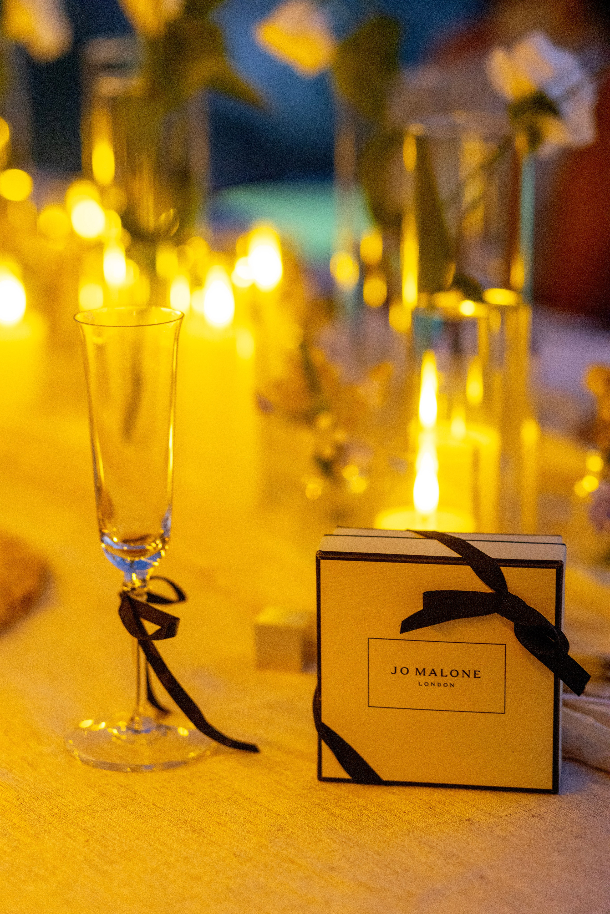 VIP catering setup with Jo Malone gift box and champagne glass