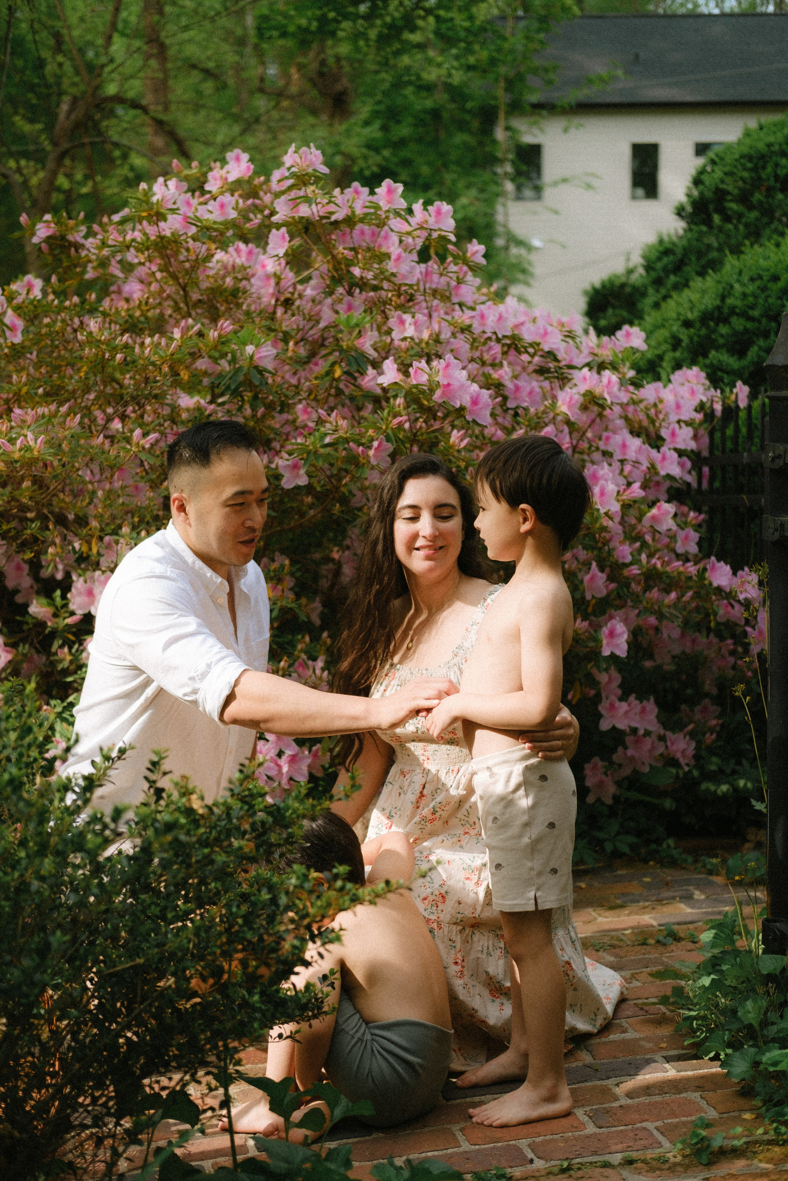 Lifestyle-documentary photo of a family in their garden in Richmond, VA