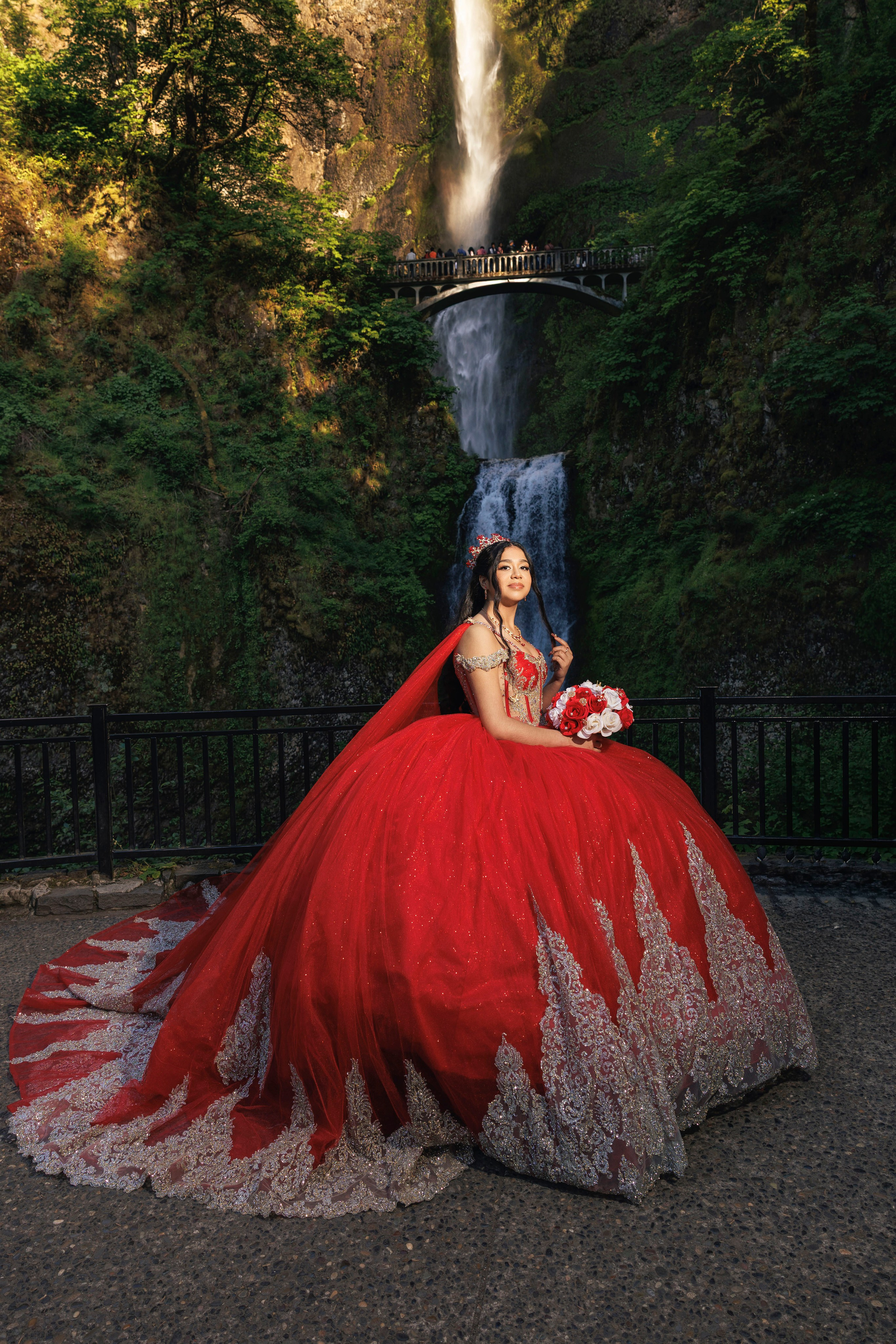 Quinceañera photos with waterfall backdrop