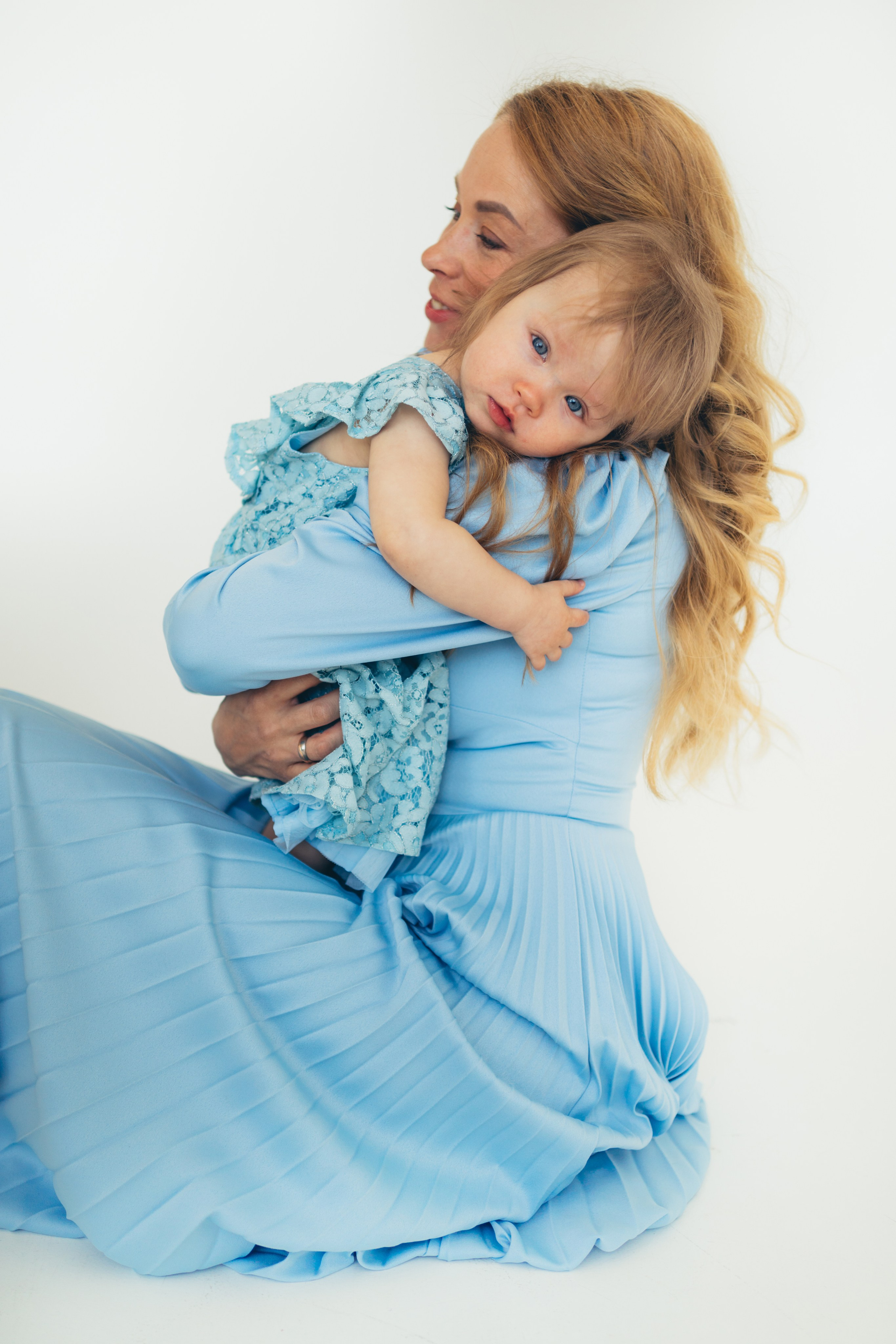 Ģimenes fotosesija. Sieviešu fotogrāfe Nadja Kraukle