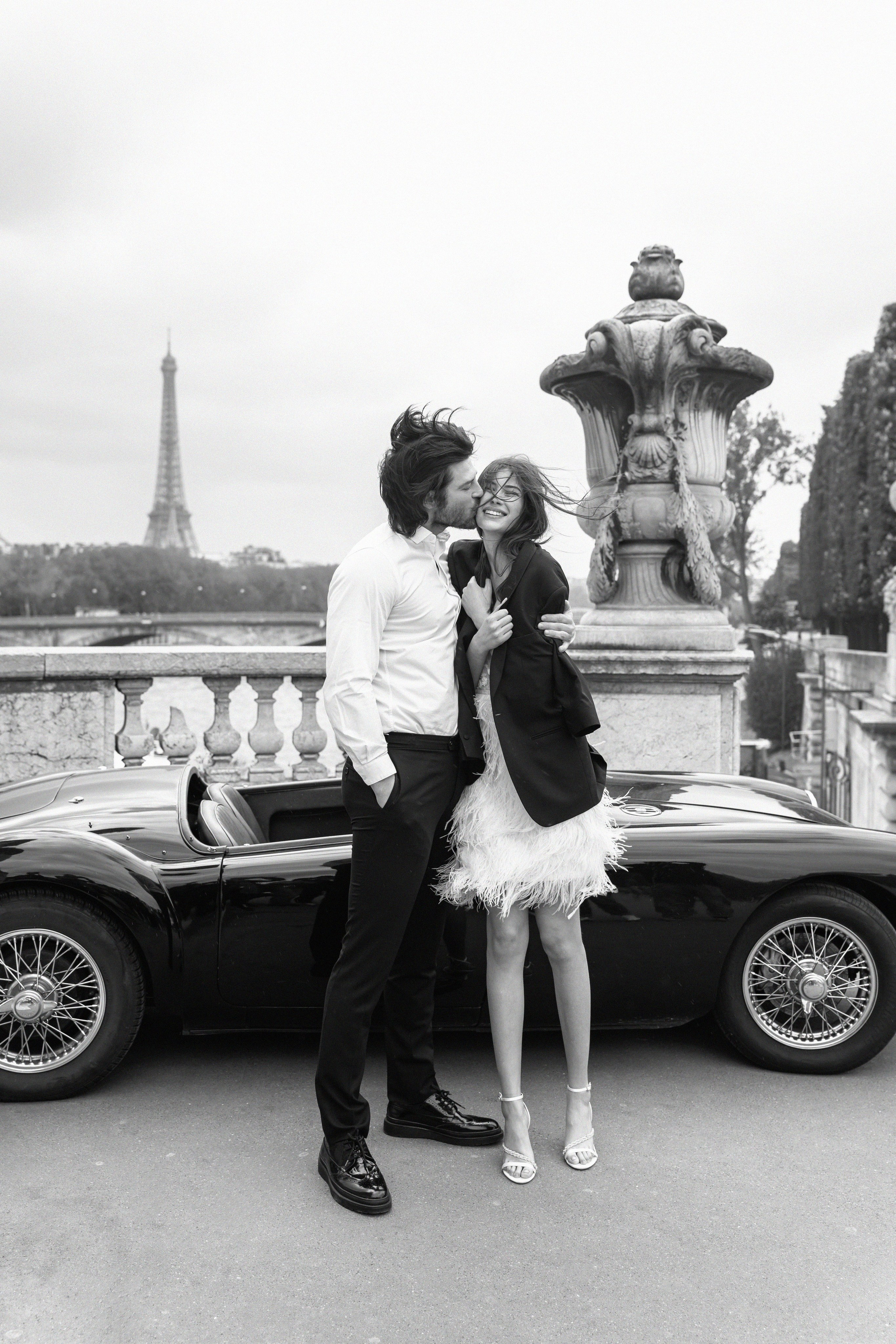 Candid wedding photo of couple laughing