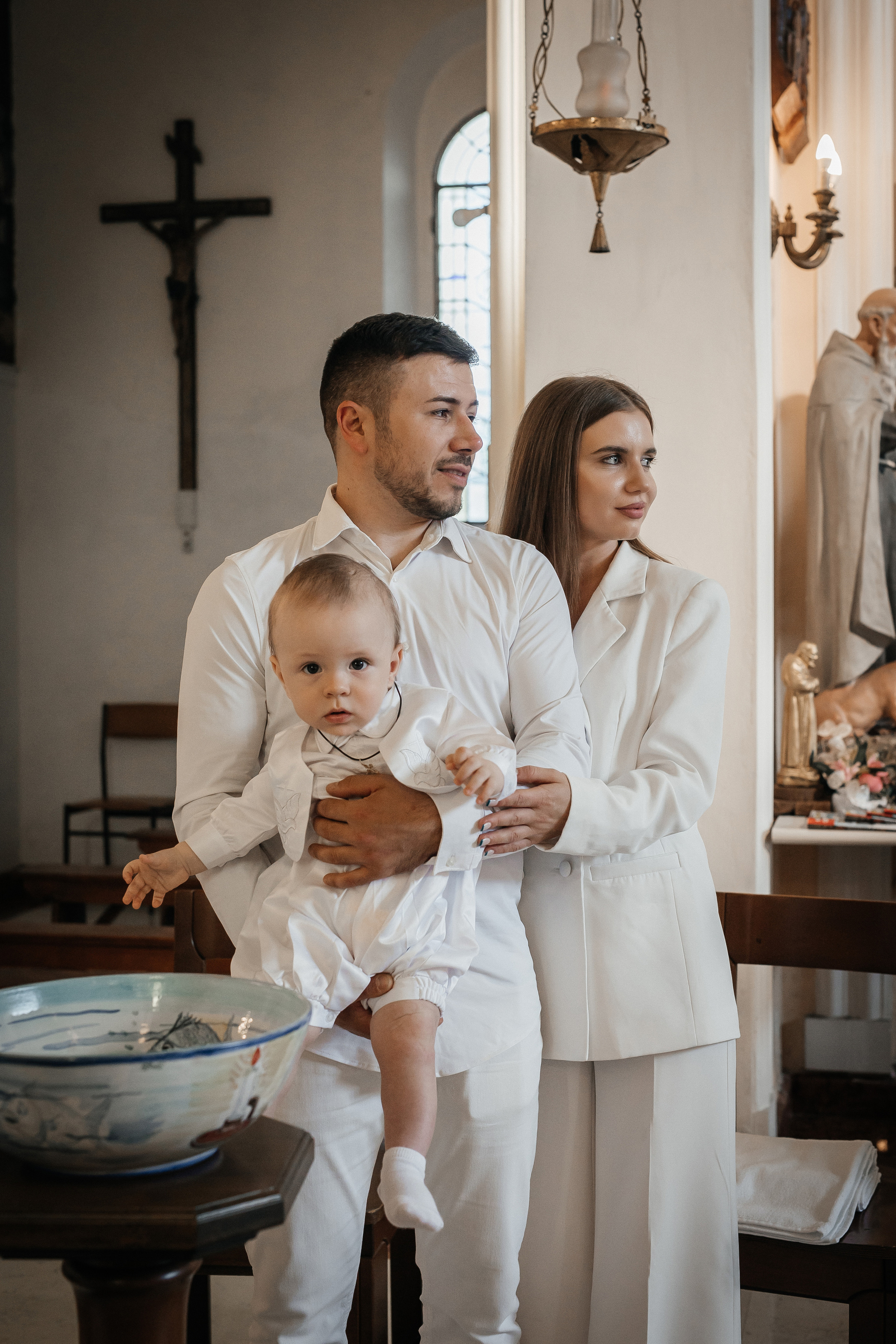 Preparazione per la sessione fotografica di battesimo