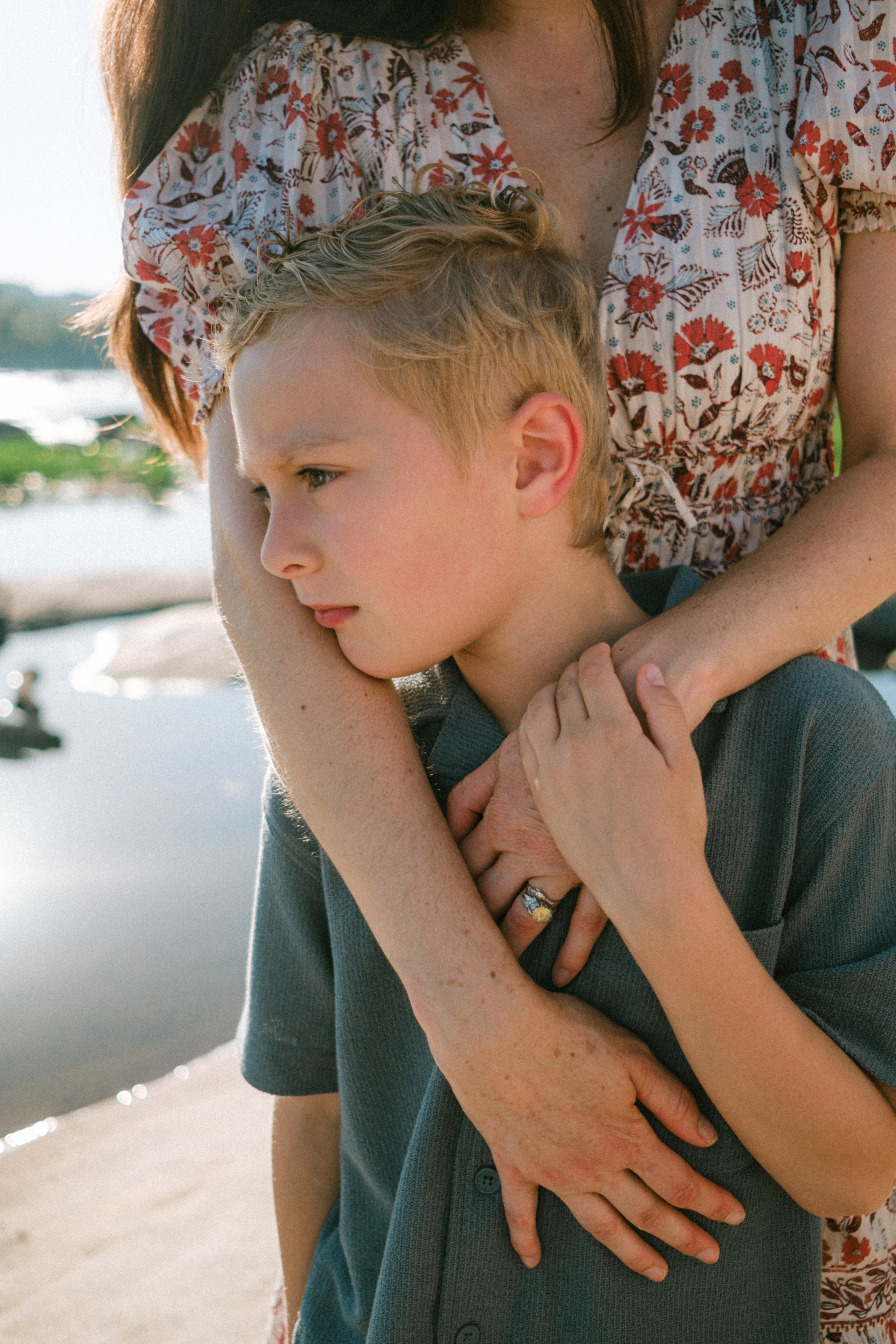 Mother hugging her son during documentary family session at Pony Pasture in Richmond, VA