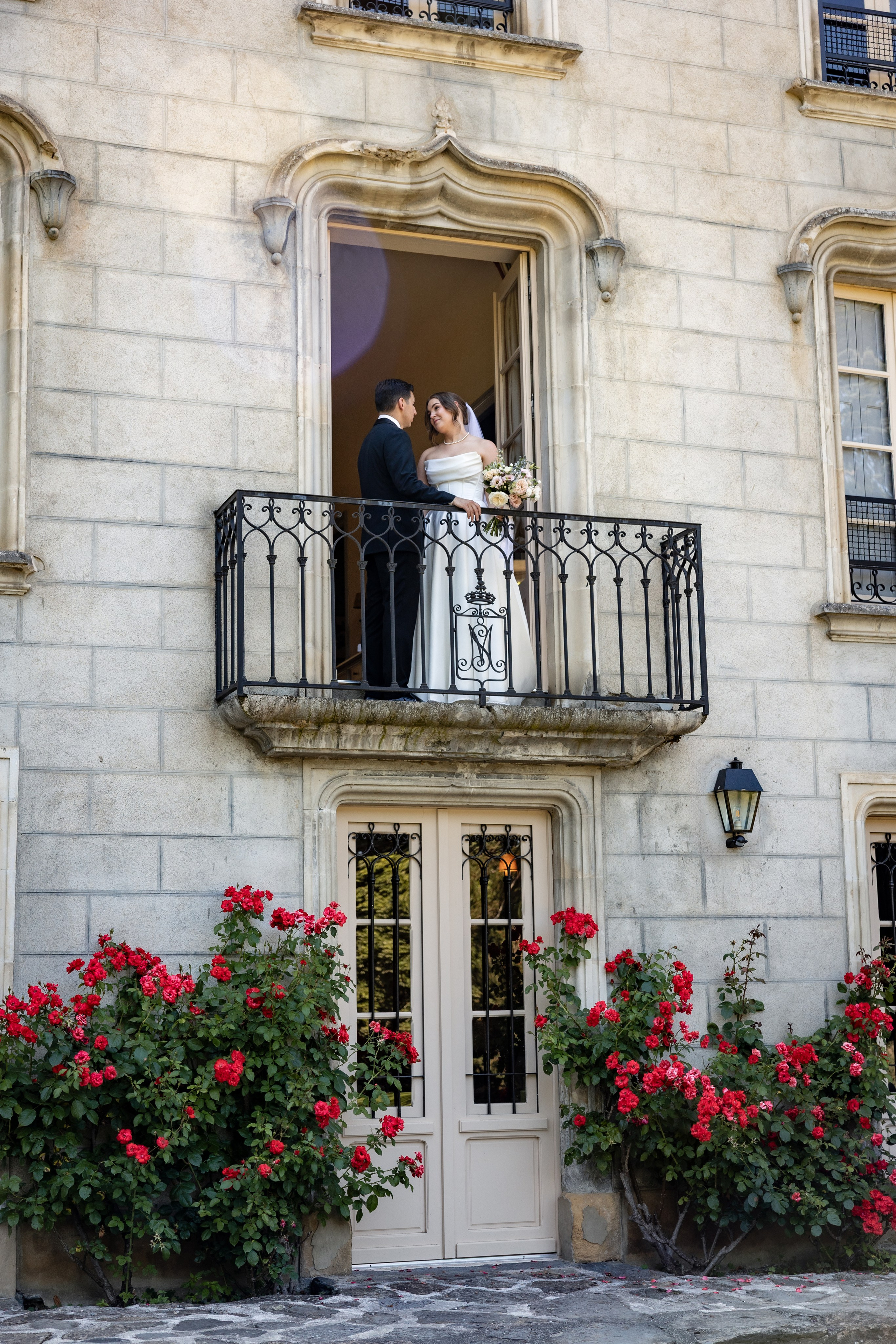 Couple on balcony at Château Bagen during elopement