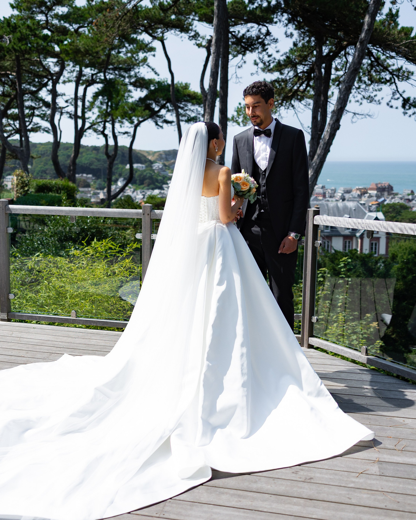 Bride and groom portrait terrace overlooking the sea Étretat — Johnny Jo wedding photographer