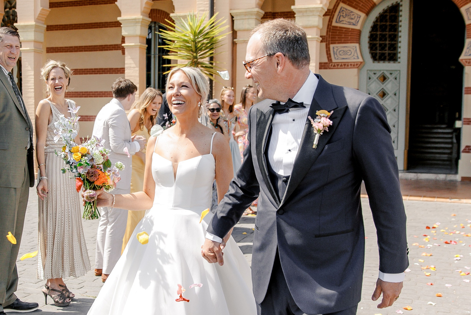 Candid wedding moment in Barcelona, capturing genuine emotions and joyful interactions
