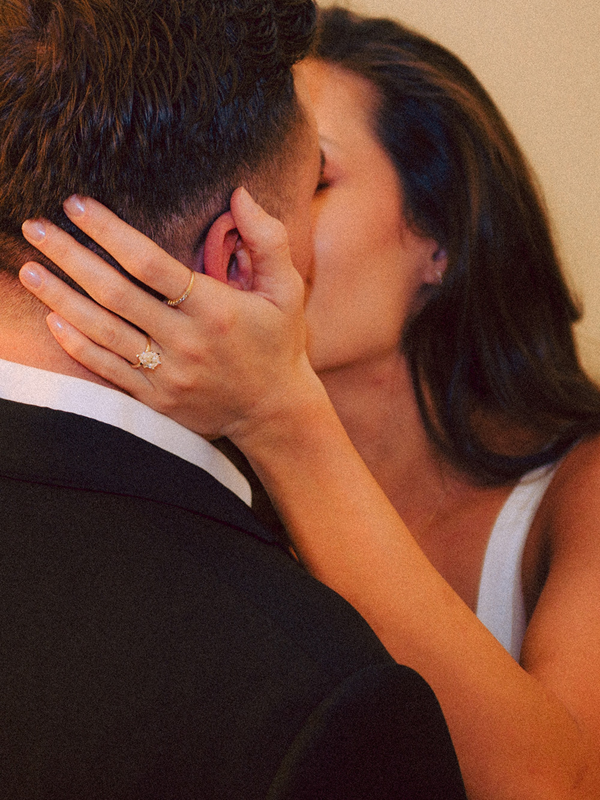 Emotional kiss after a surprise engagement proposal, captured naturally during an engagement photoshoot focused on authentic emotions and storytelling. Engagement photo session in Milano. Anamilanofoto. Anastasiia Buchinskaia