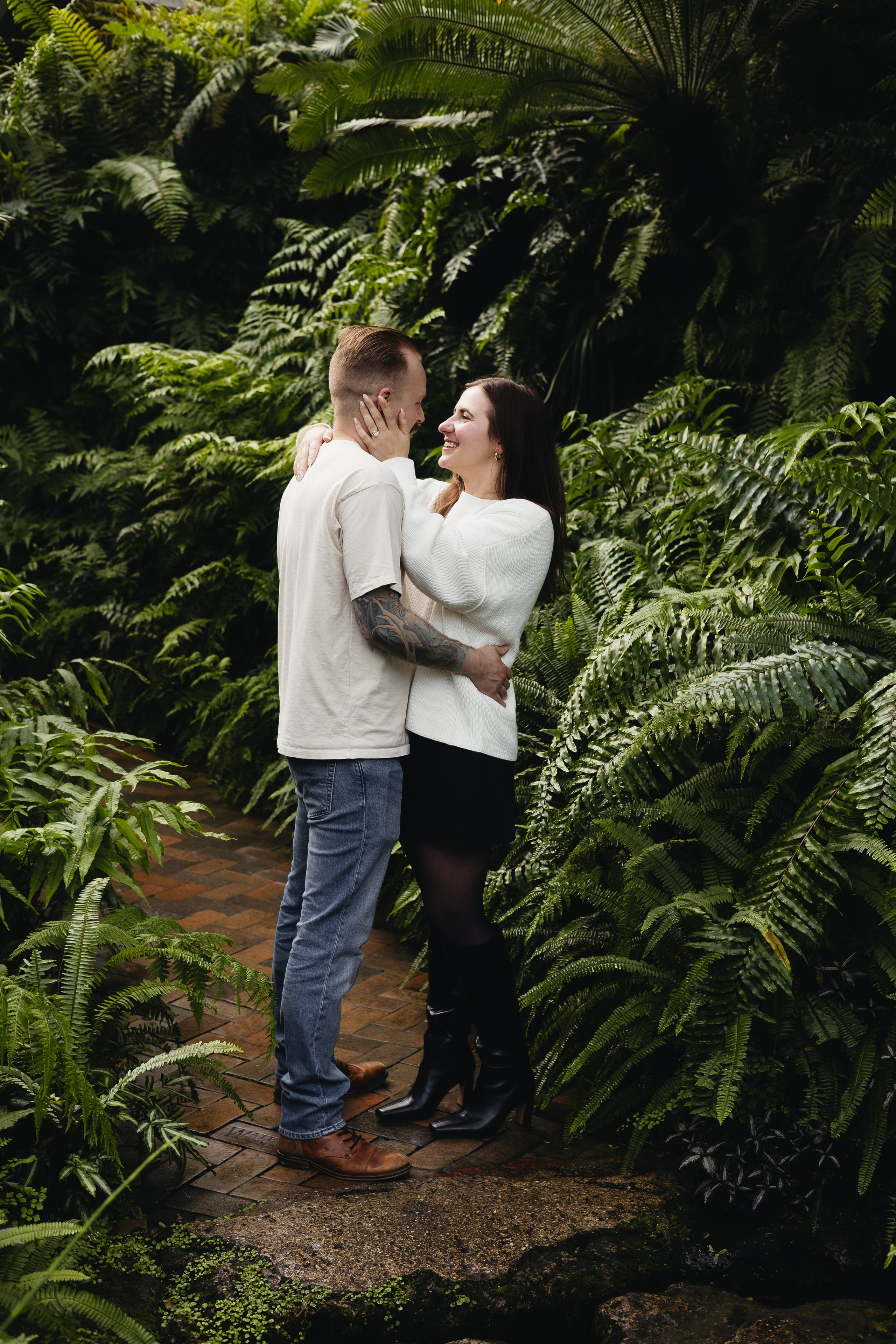 Pathway lined with plants at Garfield Park Conservatory, Chicago