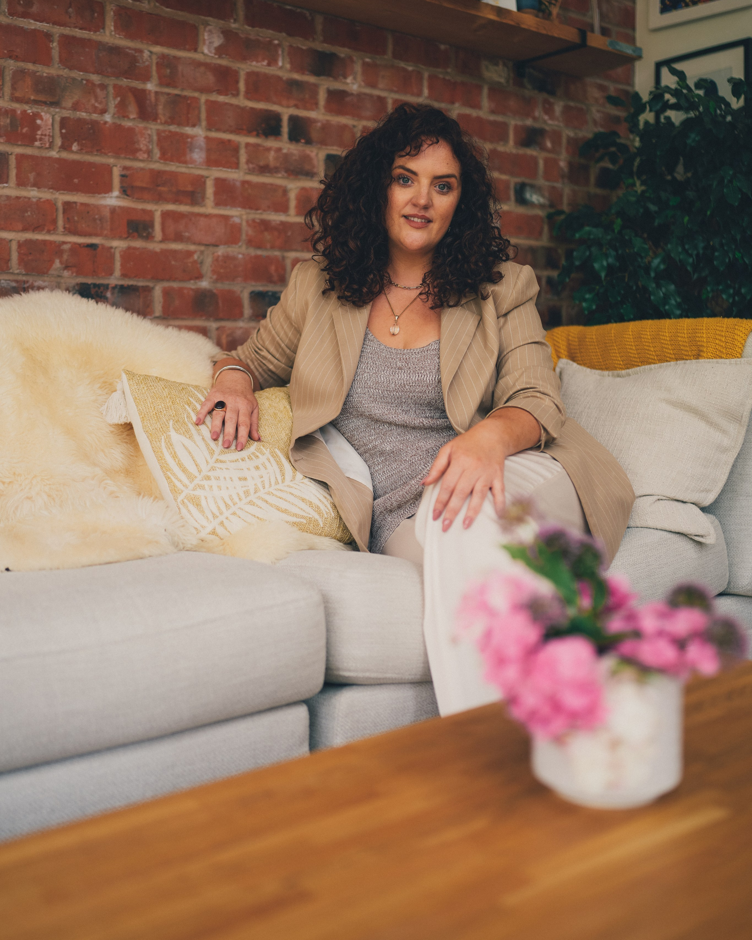 Personal branding portrait of a business owner in her studio in Solihull