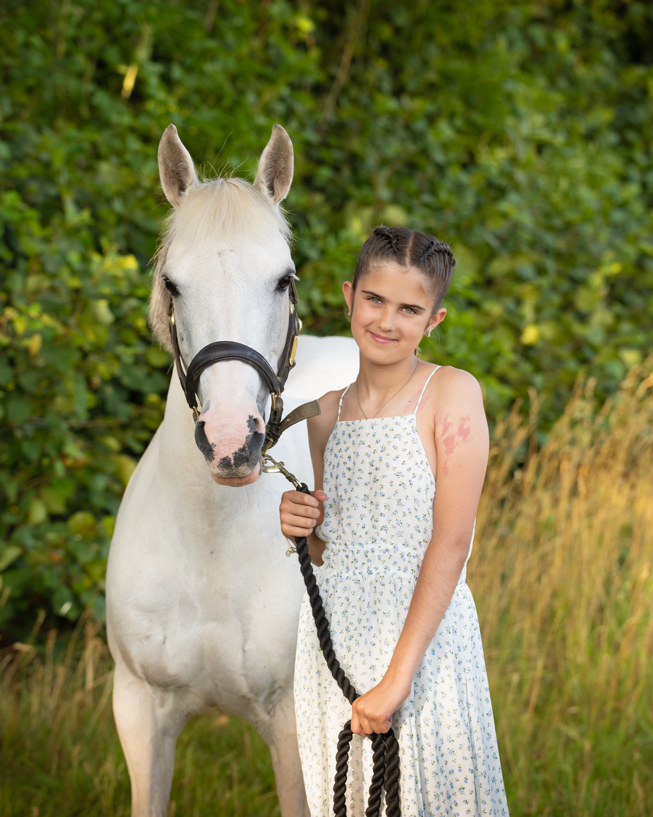 Horse and owner looking at each other with affection in rural Leicestershire
