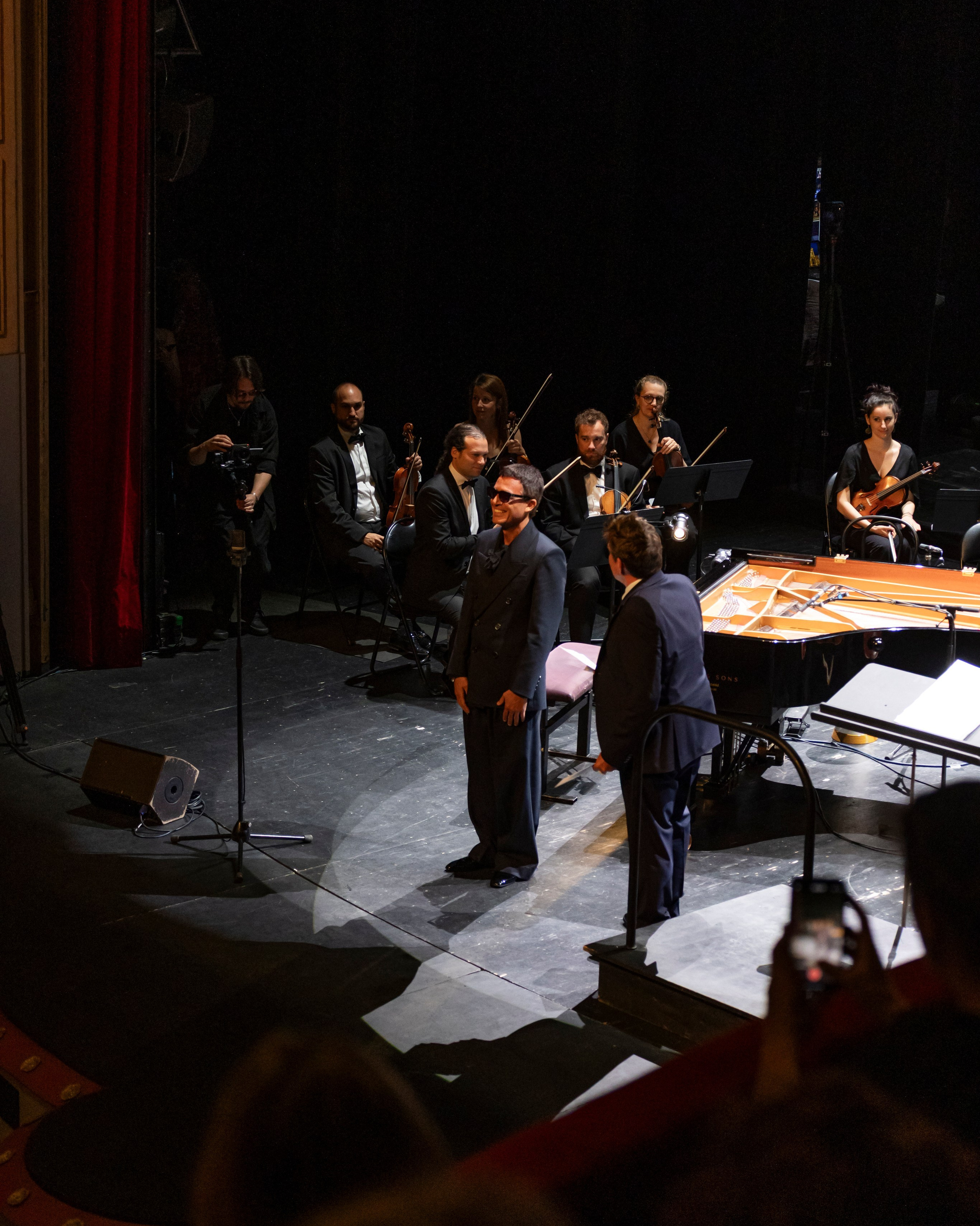 stage view with speakers and musicians during a professional event
