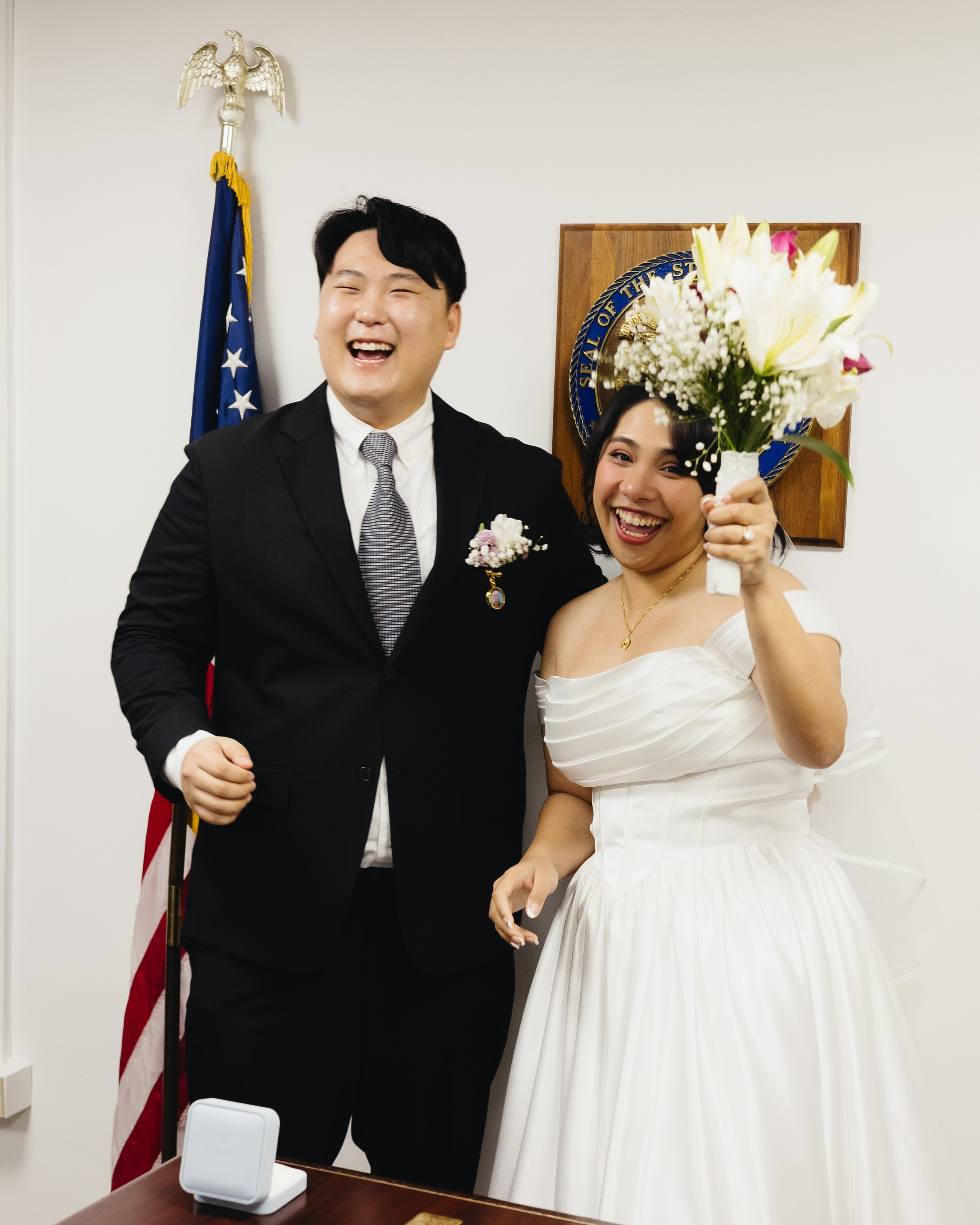 Just married couple smiling after their City Hall elopement ceremony