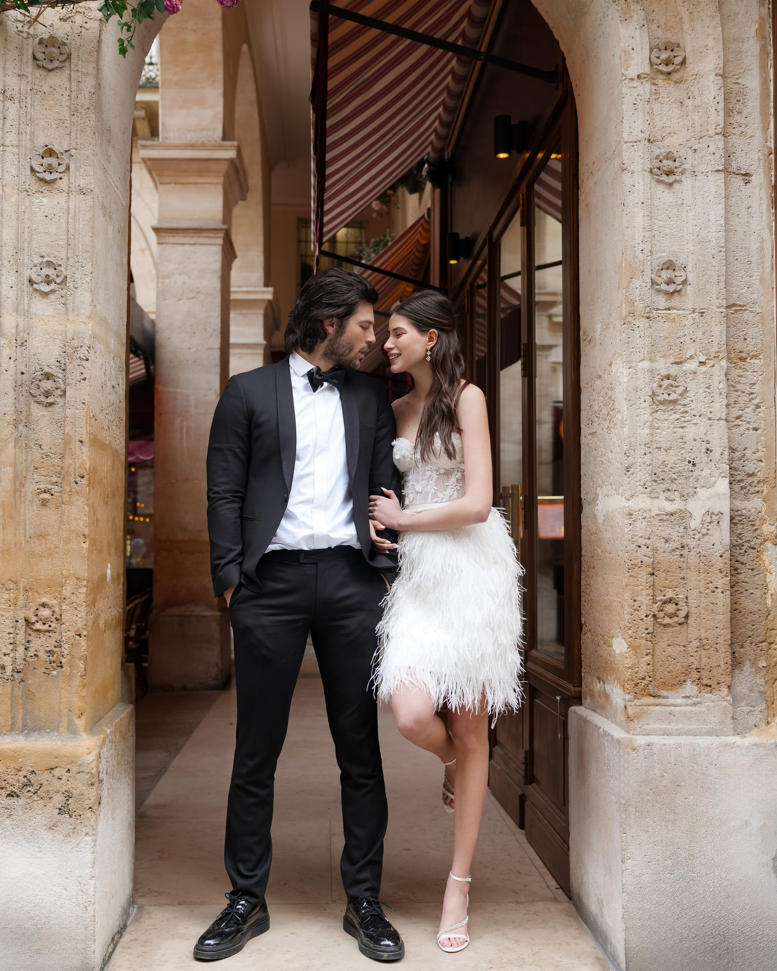 Newlyweds walking hand in hand along Protaras coastline
