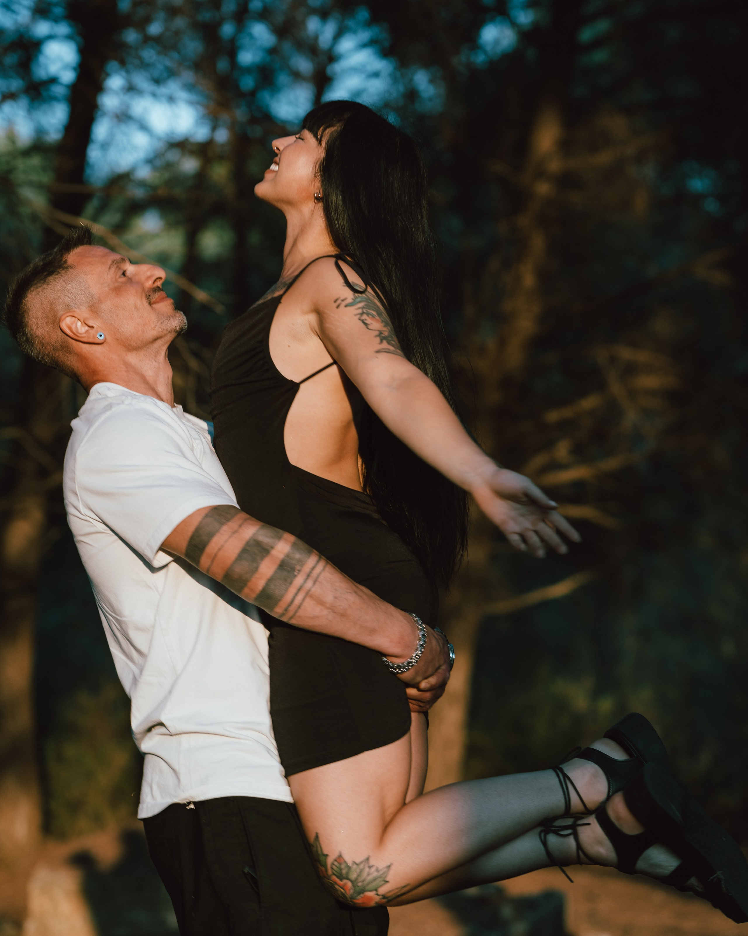 Happy couple celebrating engagement during natural and candid proposal photography in verona