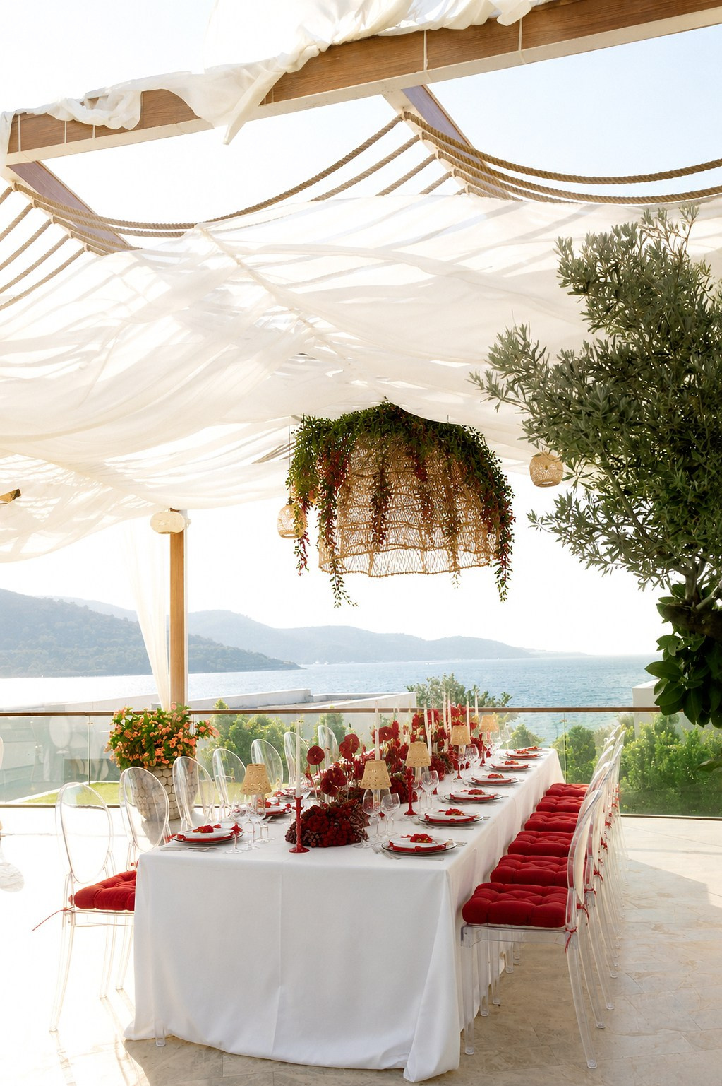 Elegant red and white wedding table decor at Susona Bodrum with Mediterranean sea views