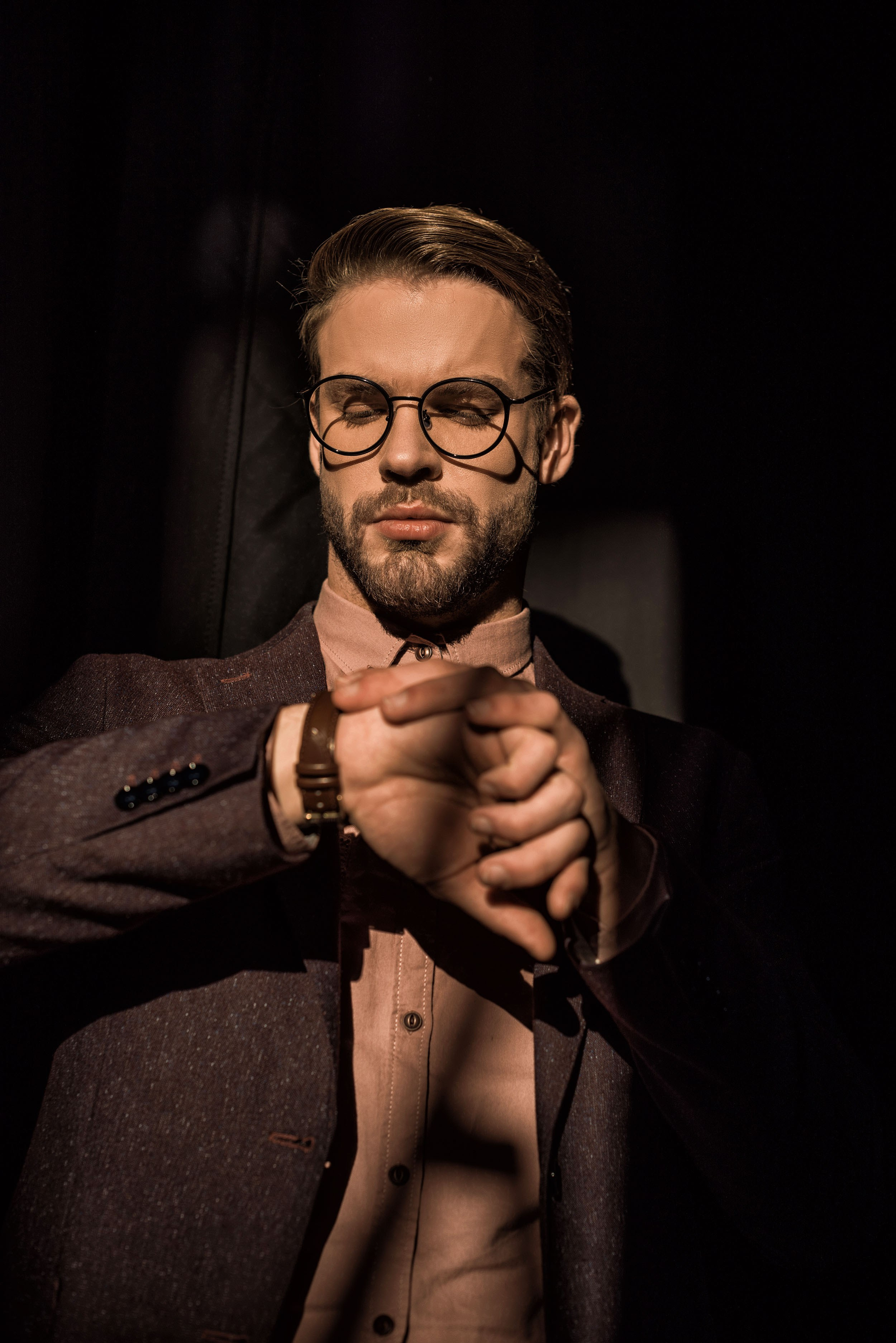 man looking at his watch portrait