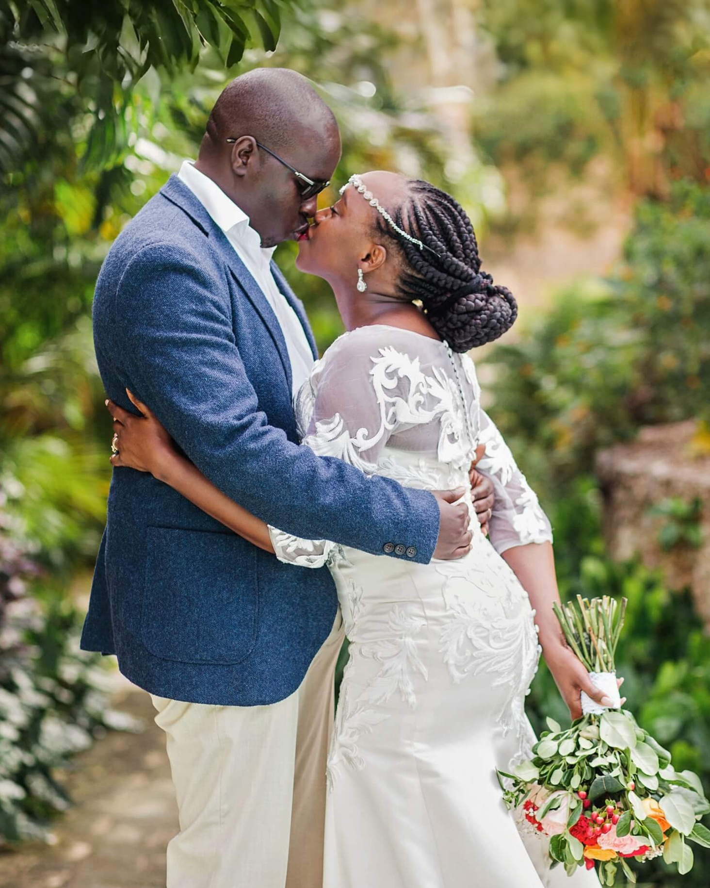 Timeless wedding portrait in the lush gardens of Medina Palms, Watamu. At Maiafreia photography, every glance and gesture tells a Kenyan love story worth remembering.