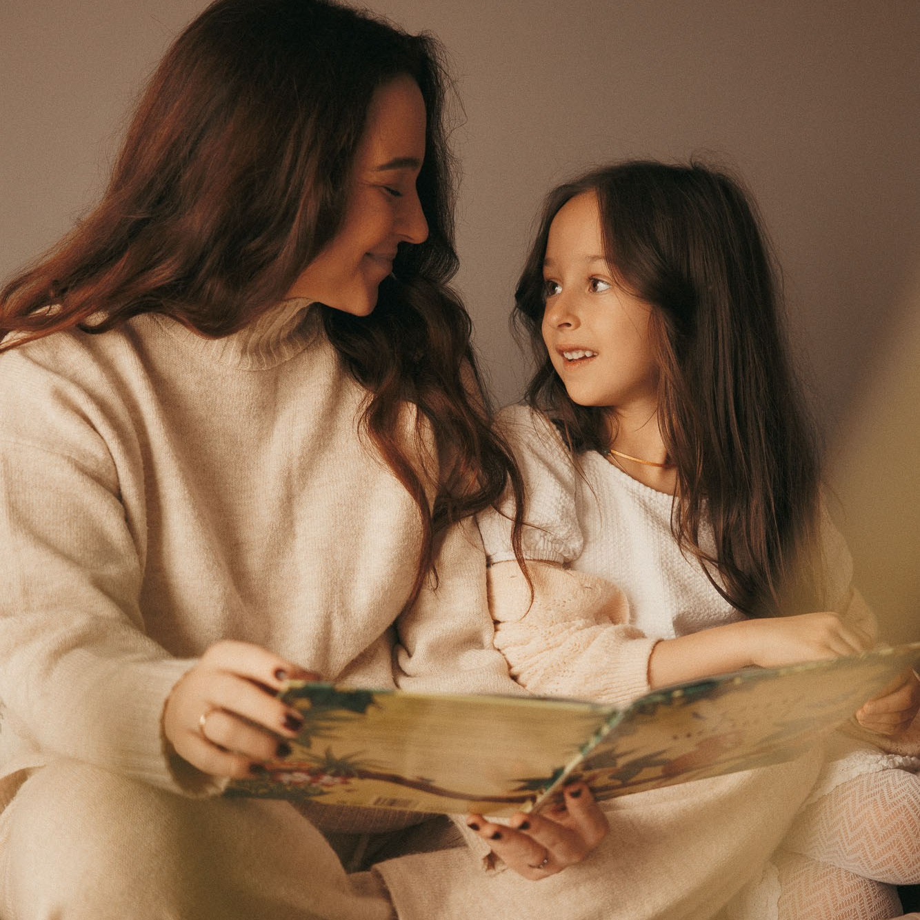 Parents and children during a relaxed family photography session at home in Montreal