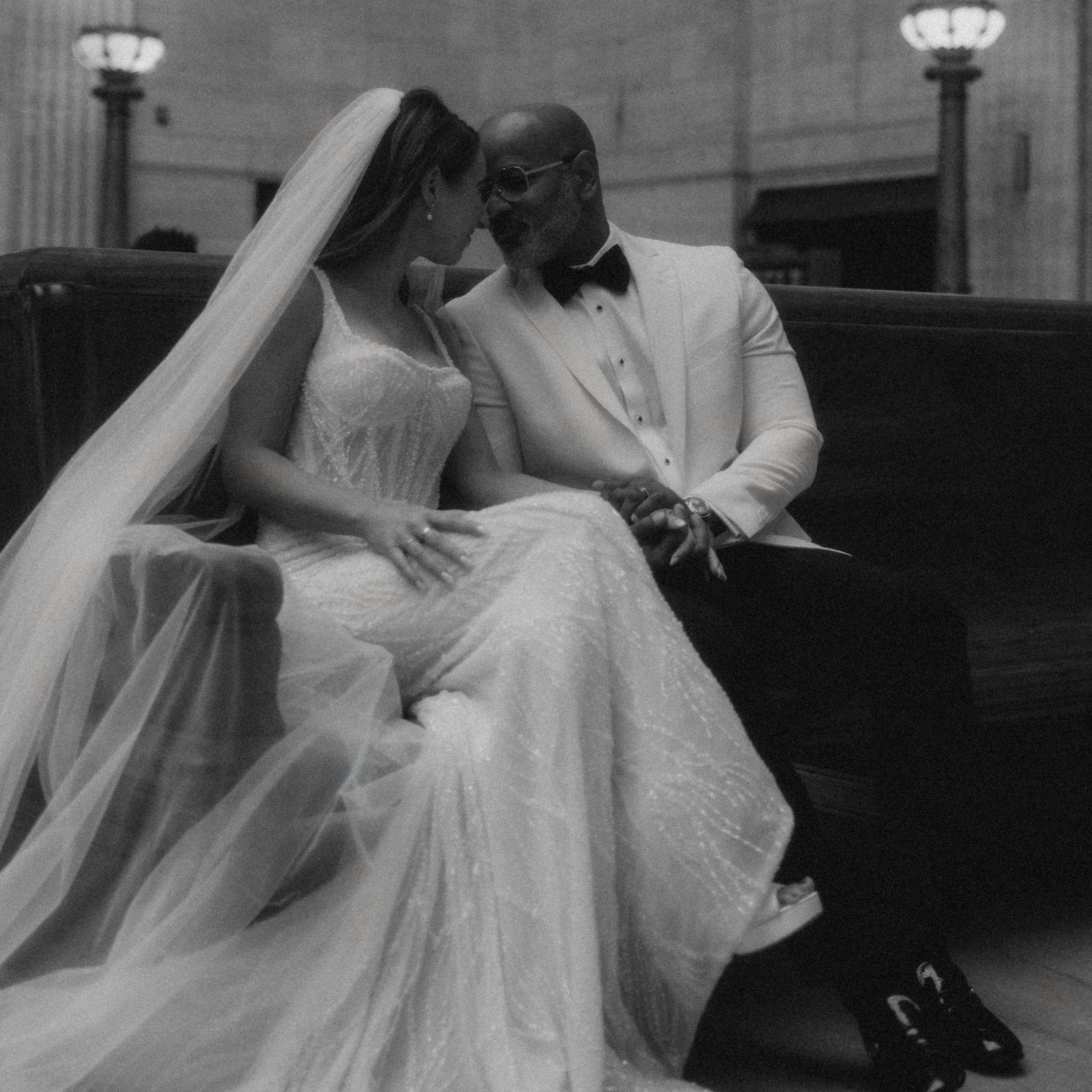 Intimate couple photoshoot in Chicago downtown with warm candid style.